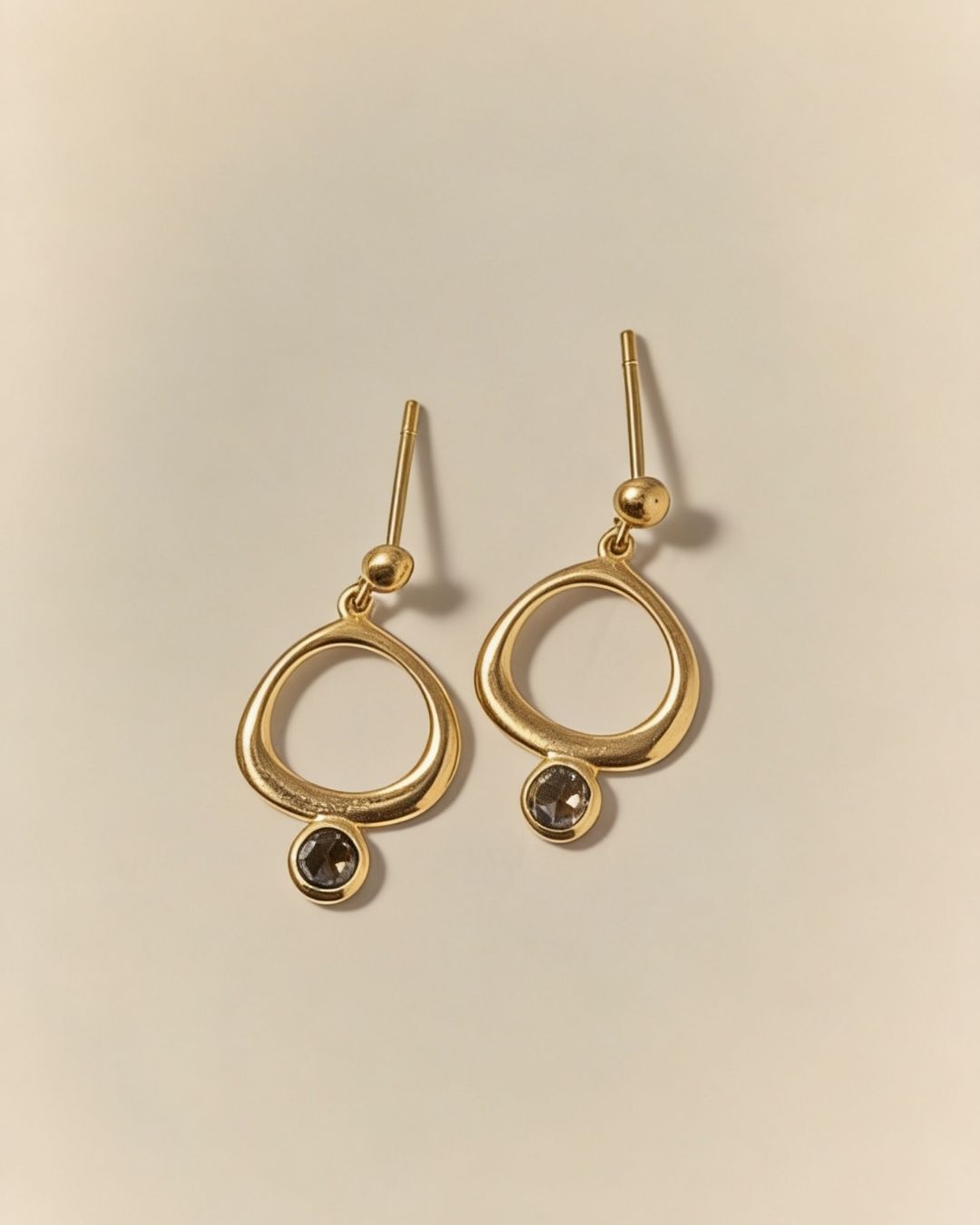 Lightness in form. Our gold curve earrings with a matt finish and rosecut brown diamonds. #fotinipsarouli #fotinipsaroulijewellery #finejewelry #handmadejewelry #earrings