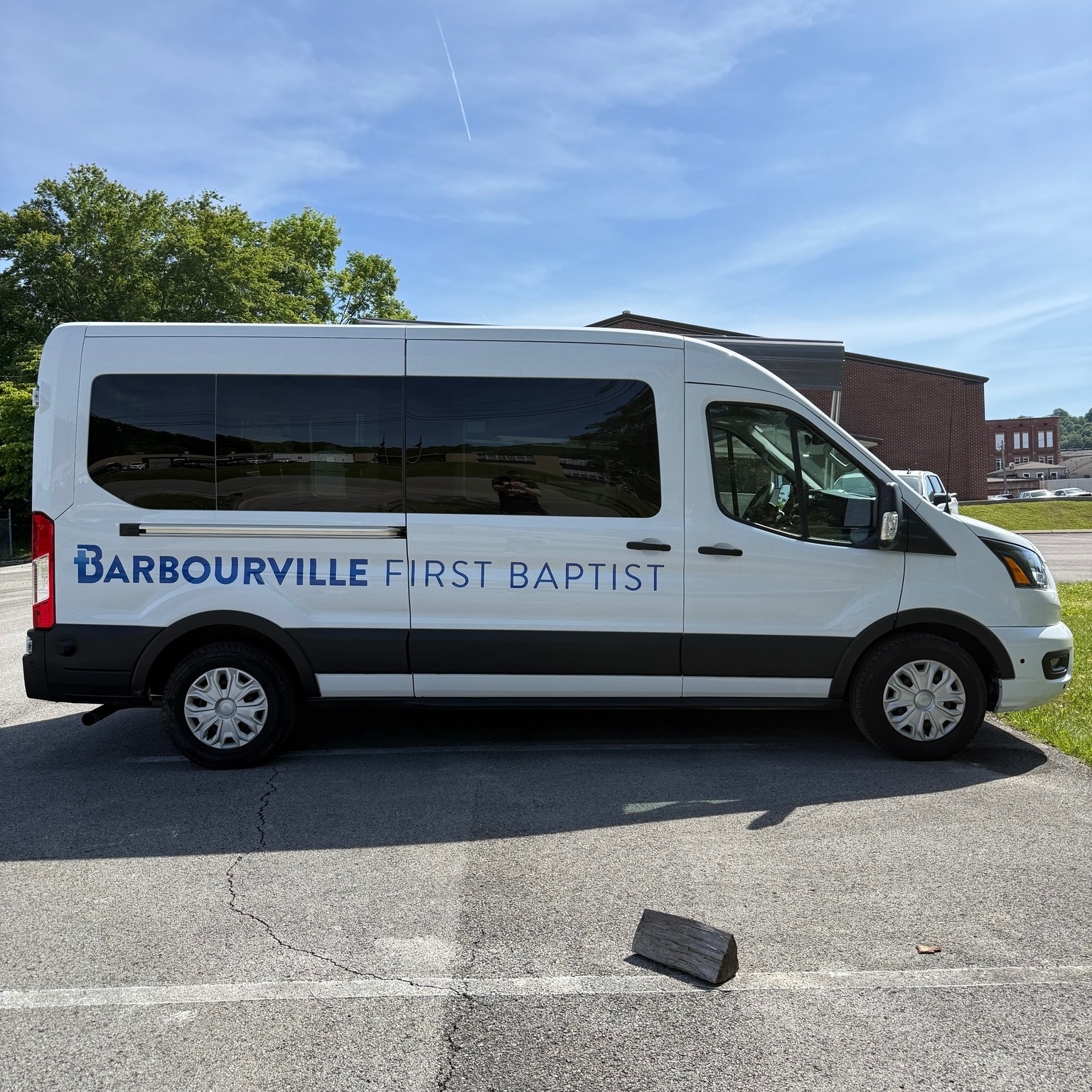 Last week in Barbourville I was able to install graphics on First Baptist Barbourville two new vans! Thank you all for the opportunity to work with you on these. Thanks to my little red-headed man for going with me.
