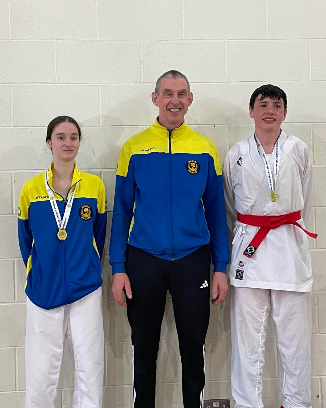 Gold medals for Rachel and Ryan at the IWKA League in Ashbourne. Coach looks happy too.