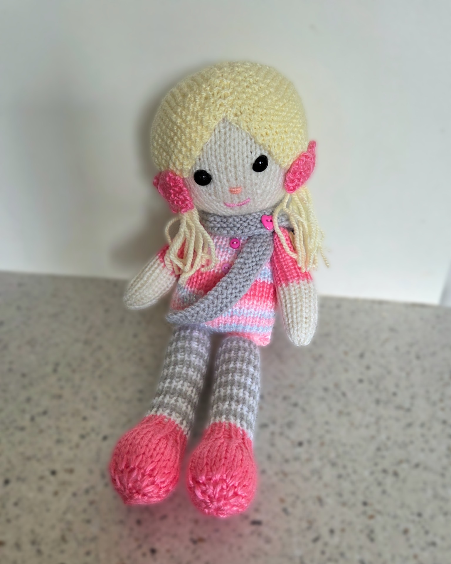 It always makes my day to see your beautiful creations!
Poppy looks absolutely lovely in these soft colours, and the self-striping yarn for her dress is just perfect.
Thank you so much, Georgie, for letting me share your gorgeous work and for inspiring others in our knitting community.
If you’d like to make your own friendship doll (and maybe share a photo!), you’ll find the link here. I can’t wait to see what you create!
https://linktr.ee/clairefairalldesigns