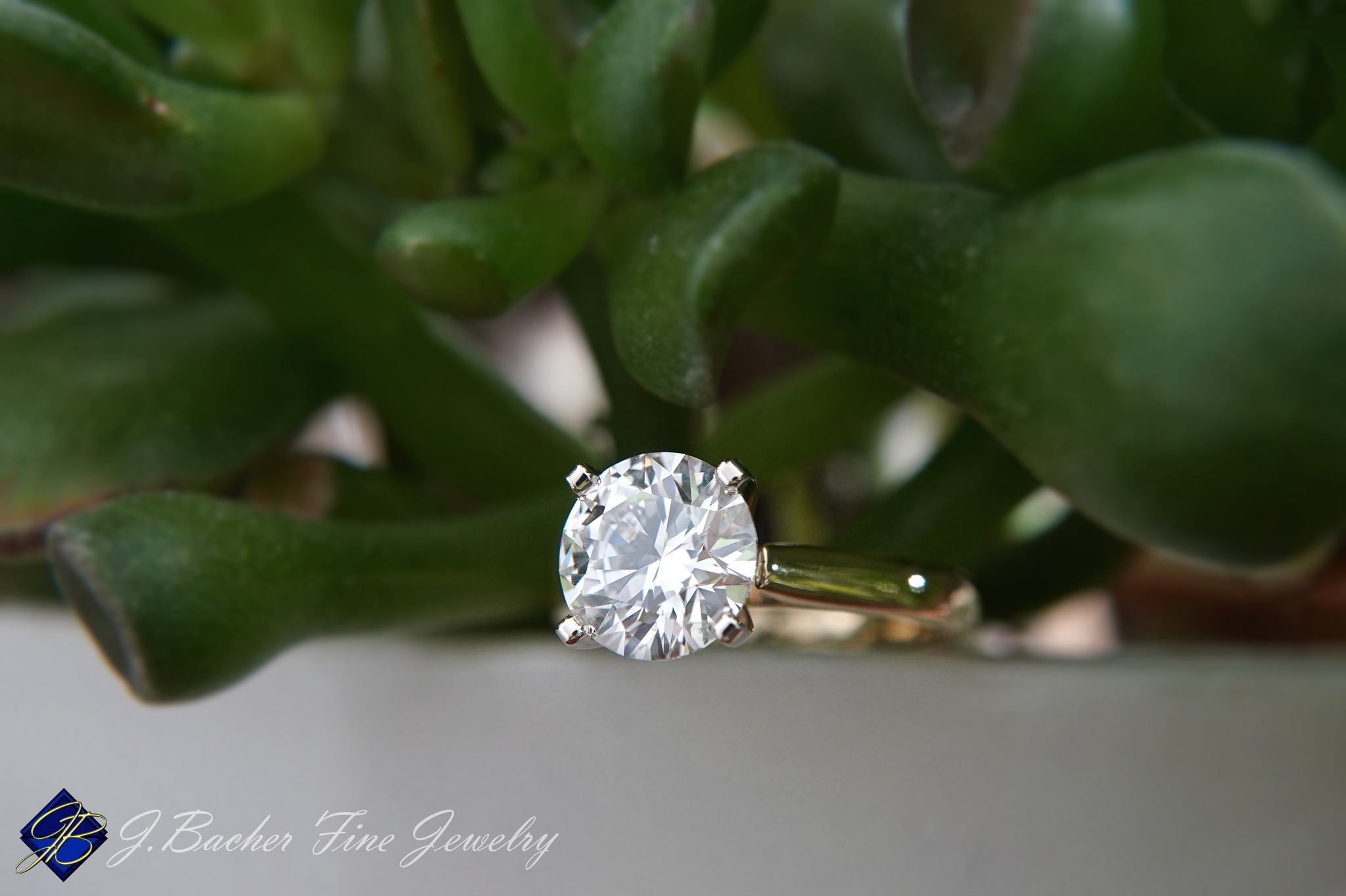 ๐ Congratulations, Nathan & Logen!
Hers: A timeless solitaire engagement ring featuring a yellow gold shank with a white gold four-prong setting, beautifully accenting her round brilliant diamond. Paired alongside is a dainty โXOโ-inspired wedding band.
His: A classic yellow gold wedding band with a satin finish and domed profile, perfectly complementing hers.
Thank you both for shopping small and allowing us to create these special pieces for you. Wishing you a lifetime filled with love, laughter, and the little moments that mean the most. ๐