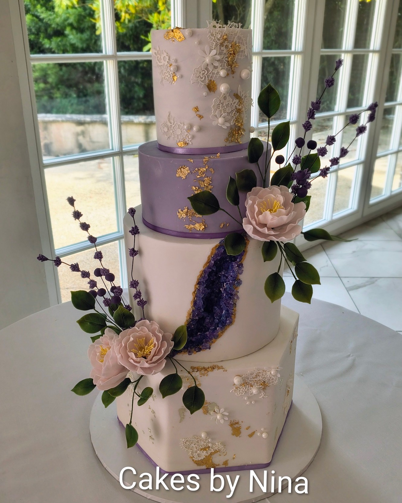 We had the pleasure of being a small part of this lovely couples day yesterday at the gorgeous @froyleparkcountryestate , we created a four tier cake with chocolate at the bottom, then vanilla, then our lavender and chocolate and lemon on the top, with gold leaf, edible lace and edible pearls, and an crystal sugar geo effect and sugar flowers and foliage, wishing you both all the happiness together, and thank you for choosing me to be a small part of your amazing day. much love ššš
There were also some incredible suppliers to help create the most magical of days:
Venue - @froyleparkcountryestate
Photographer - whom I highly recommend on my website @photoforrester
Styling - @ambiencesouthdowns
Flowers - @pennylaneflowers
Artist - @helenridleyillustration
Violinist - @sussexviolinist
Wedding Planning Services - have to confess a joy to meet @eventswithrio
And last but not least the gorgeous couple - @aj.aura and @savzaf
#cakesbyninacamberley #weddings #weddingcake #sugarflowers