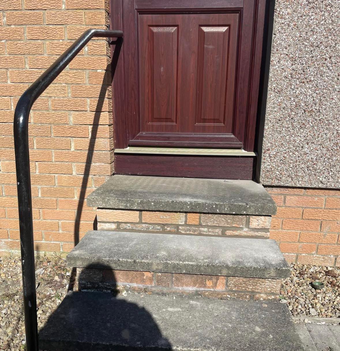 Small property maintenance works taking place with brick work repointing — West Lothian