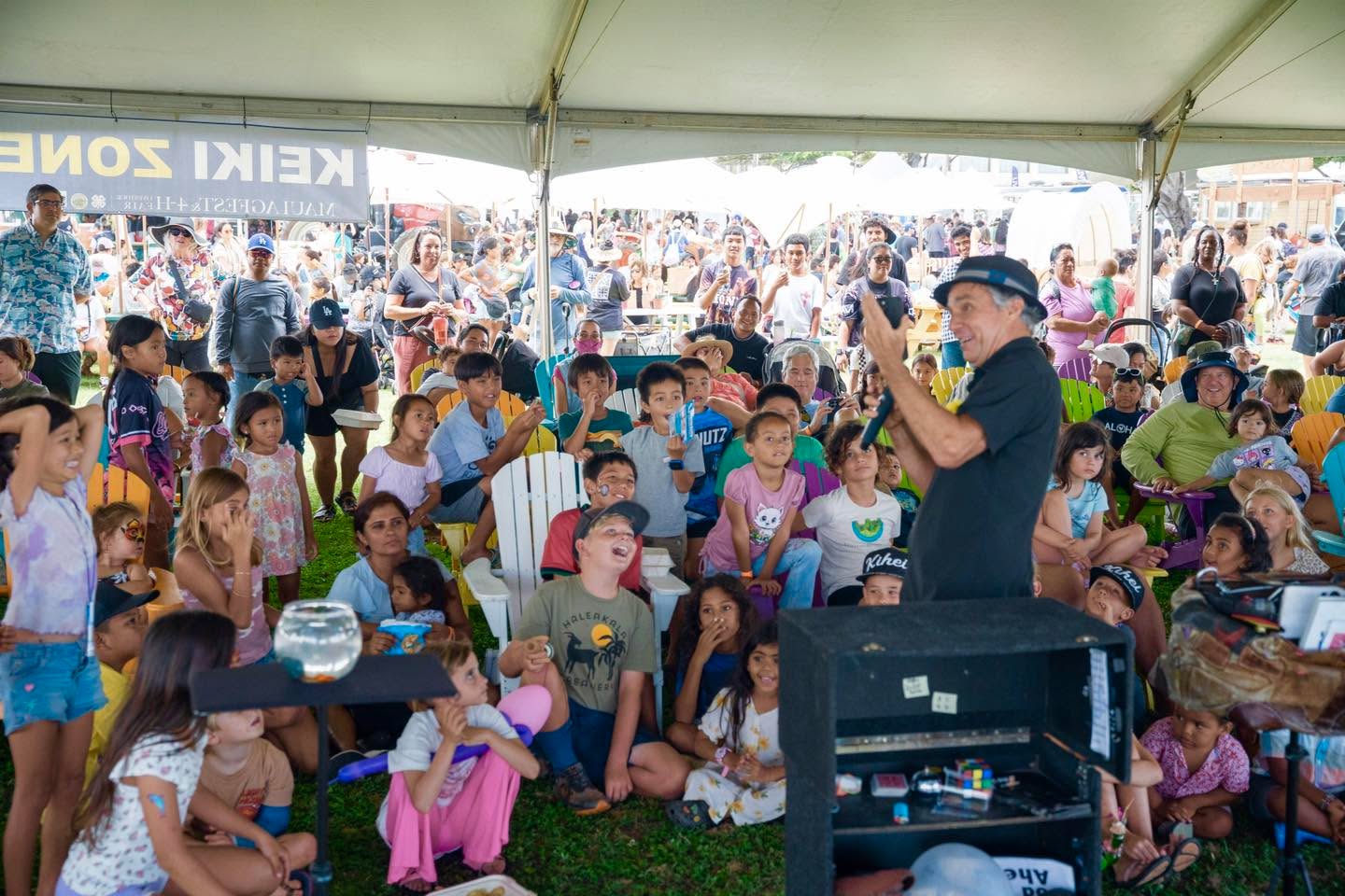 This pic is Fantastic Douglas DeBoer, thank you for capturing those Faces. At first glance, it’s just another crowd shot… but when you zoom in- that’s when you see that Magic Is Real.
You don’t have to attend one of Maui’s biggest events (AgFest- last Saturday) to see some Magic. You can just come to the Mulligans Magic Show…tonight! Or any Thursday! Let’s see if you make one of those faces. Remember- my show is for All Ages. Make a reservation. Here comes Summer. www.mulligansontheblue.com
#mulligansmagicshow #mauiagfest #mauiagfest2026 #magicbrent #rainingentertainment #magiconmaui
