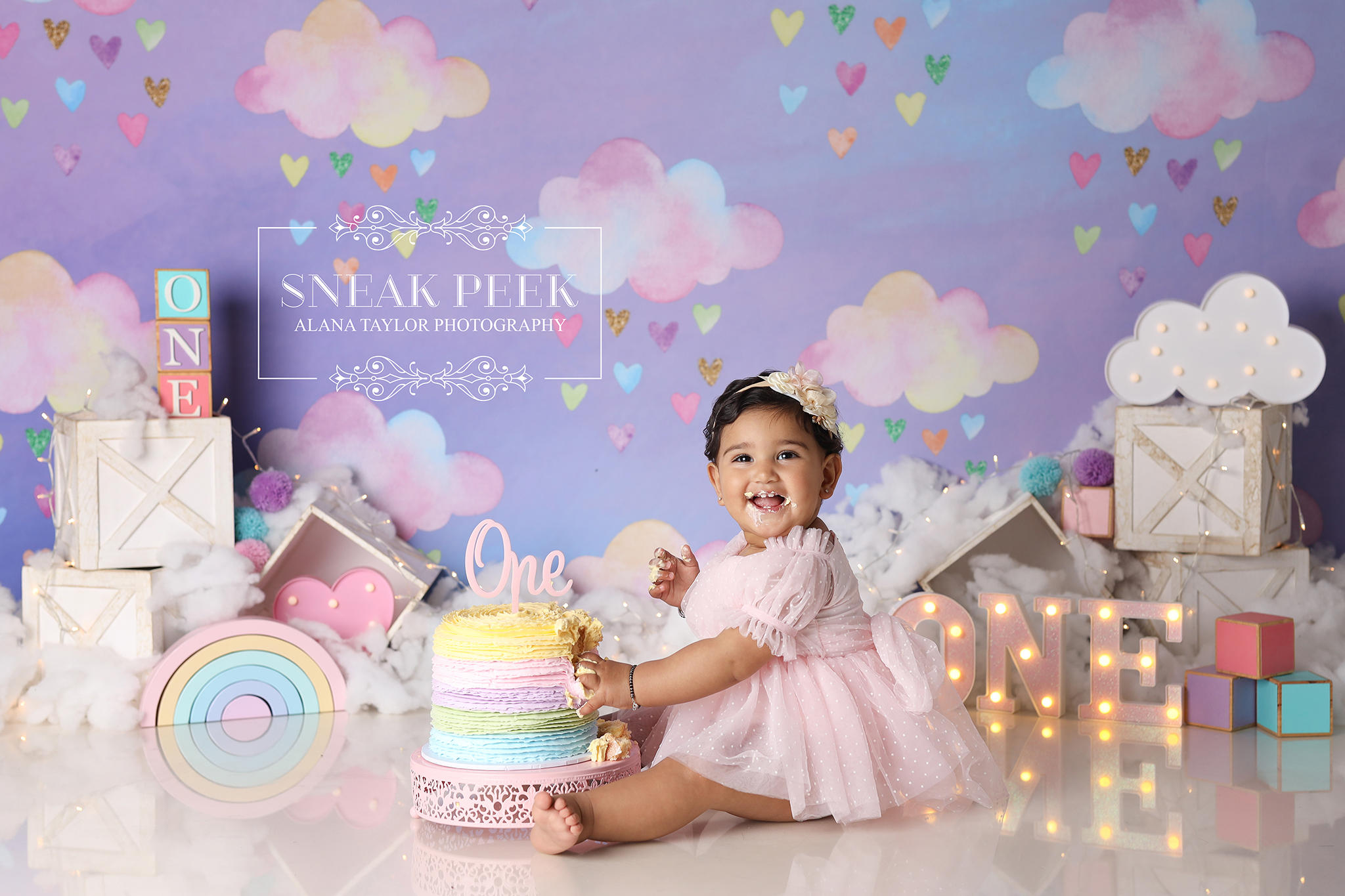 Everything about this setup said dreamy. Everything about Arnaaz said let's wreck the cake. 🌈🤣
This gorgeous ONE Sweet Rainbow Dream Cake Smash was filled with pastel skies, fluffy clouds, colourful hearts and a rainbow cake that looked far too pretty to eat.
Arnaaz was all smiles from the moment she stepped onto set, showing off those chubby cheeks and cheeky expressions while surrounded by dreamy rainbow details and glowing lights.
Tiny fingers became surprisingly efficient demolition tools as layers of pastel buttercream disappeared, chunks of cake landed on the floor and icing somehow travelled far beyond the immediate cake zone. 🎂😂🙌
The bigger the mess became, the happier Arnaaz looked, and that's exactly why I love photographing first birthdays. The unpredictable moments are always the best ones.
Sweet, colourful, messy and completely unforgettable. Just the way a Cake Smash should be. 🌈🍰💕
#cakesmashphotographermelbourne #cakesmashphotography #firstbirthdayphotos #babyphotographymelbourne #rainbowbirthdaytheme #clyde #cranbourne #berwick #pakenham #officer #langwarrin #southeastmelbourne #firstbirthdaycake
Melbourne’s Leading Newborn, Baby and Cake Smash Photographer – Book Early!
www.alanataylorphotography.com.au
Gorgeous Cake by @Procrastibakery & Eatery
https://www.facebook.com/profile.php?id=61558649999526
- Newborn Photography Melbourne
- Smash Cake Photography Melbourne
- Newborn Photographer Melbourne
- First Birthday Cake Smash Photos Melbourne
- Cake Smash Photography Near Me
- Cake Smash Photos Melbourne
- Newborn Photography Near Me
- Newborn Baby Photographer Melbourne
- Cake Smash Photographer Melbourne
- Affordable Newborn Photography Melbourne
#cakesmashphotographymelbourne #cakesmashphotographermelbourne #babyphotographermelbourne #firstbirthdayphotos #smashcakemelbourne #cakesmashfun #firstbirthdaycakesmash #firstbirthdaysmashcake #smashcakephotographermelbourne #cakesmashphotosmelbourne