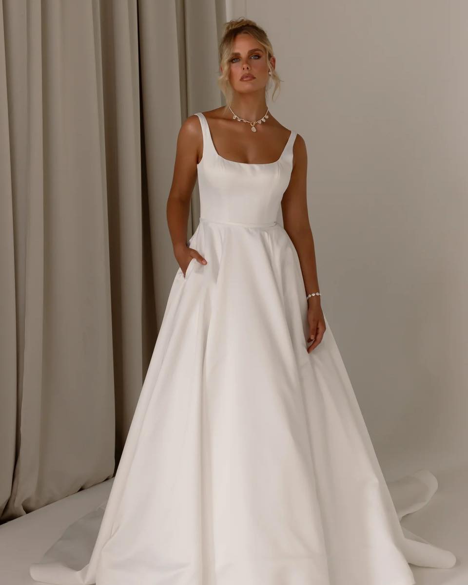 NEW ARRIVAL ✨
Timeless elegance meets modern refinement.
Crafted from lustrous satin, the dress features a structured square neckline and wide straps for a clean, contemporary look.
Be the first to try her on by booking your appointment today, visit www.theivorylounge.co.uk 🤍
#bridalera #2026bride #2027bride #bridetobbe #engaged #2027wedding