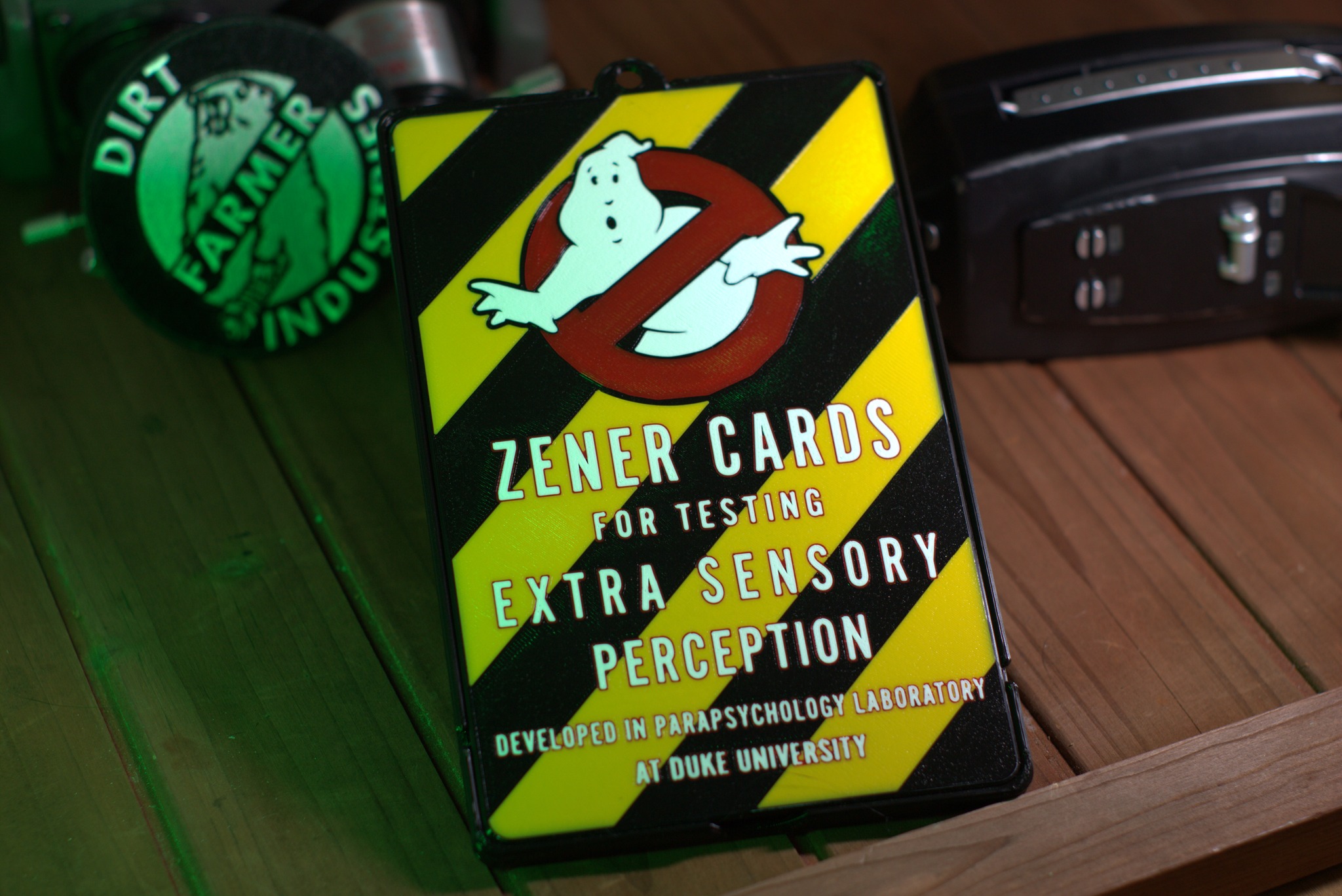 Made these last summer and forgot how good this one came out.
The Zener Card Case started simple — "what if we made a case to carry the ESP cards from the HasLab Two in the Box set?" That turned into a rabbit hole: the iconic GB1 scene, the Duke University parapsychology program down in Durham, the history of Zener cards in general. The project spiraled deeper than expected. We ended up recreating the original box art for the "classic" version, and adding this fan-specific twist that made the whole thing feel like it somehow made sense in the universe.
That's what I dig about the pieces that earn a place in the shop. A small accessory becomes a conversation piece — an Easter egg for cosplayers, a lore drop for charity tables, a bit of fan-made art that gives people something to connect over.
We haven't sold these in a while. An order came through this week and reminded me this thing exists. Glad it did.
Still a few left in stock if anyone wants one.
dirtfarmerindustries.com