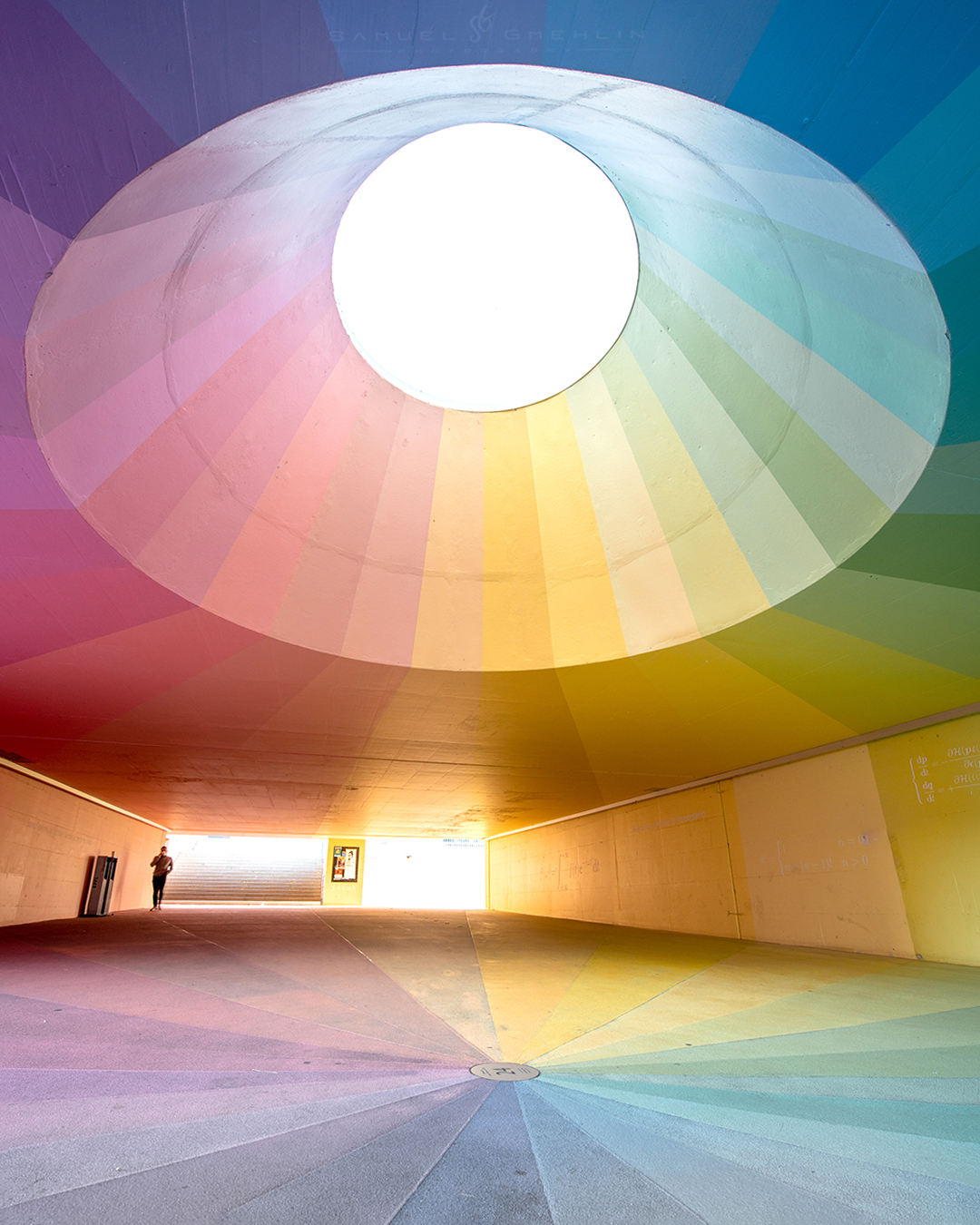 Chromatic Orbit
•
EPFL has always had a strong focus on innovation, but what surprised me most was how much attention was also given to the visual atmosphere of the campus itself. This underpass connecting the metro station to the university felt less like a transit space and more like an art installation. I liked how the giant circular opening pulled all the colors inward, almost like the whole structure was built around light itself. One of the most unexpected architectural spots I found in Lausanne. 🌈🏛️
•
Swipe ➡️ for the print version!
•
@nikoneurope #nikonD750 AF-S 14-24mm f/2.8 ED VR
•
ISO 100 | f/7.1 | 1/5s
•
•
#architecturedesign #architecturelover #architecturephoto #archilovers #raw_architecture #colorpalette #colorfulart #geometryart #designporn #architecturephotography #epfl #lausanne #switzerland