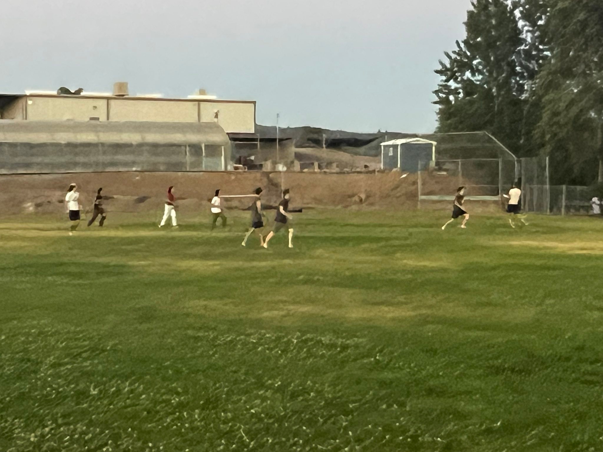 A little ultimate frisbee for some of the teen boys of the church. Perfect night for it.