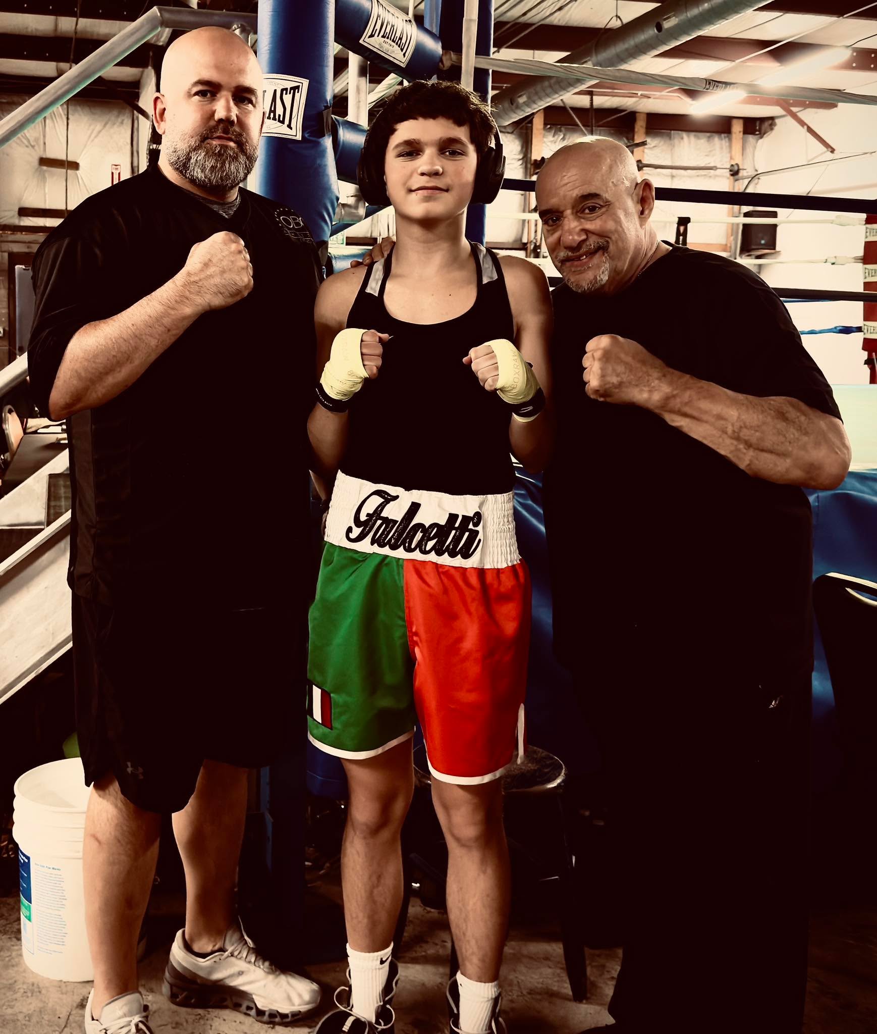 My son’s bout was canceled but he came ready for it! We did take a second to take a picture with the legendary, Ray Casal! He’s been in combat sports for 54 years!
Fun fact, Dom designed these trunks on his own and they are nearly identical to the pair I grew up in!