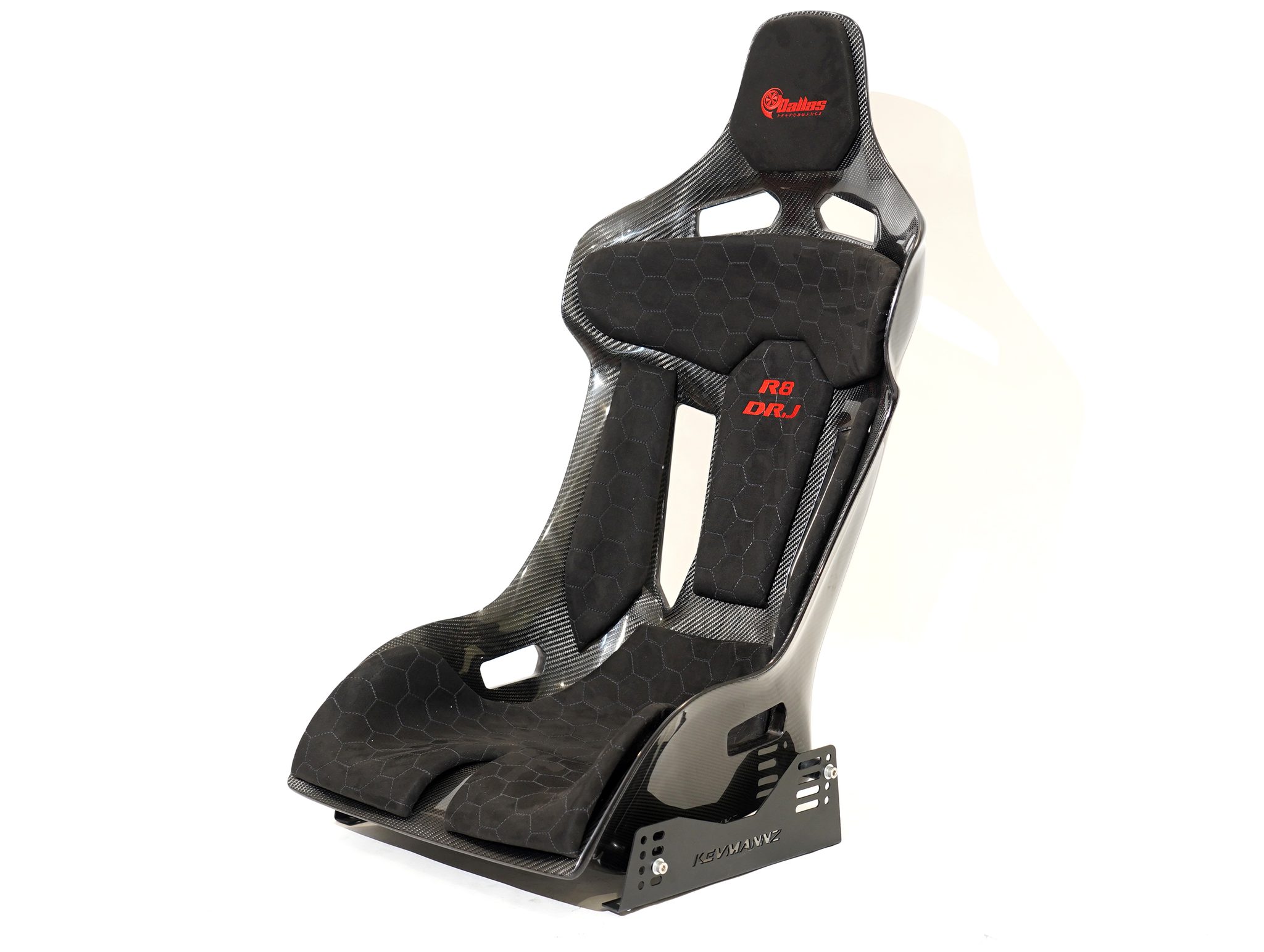 Rise to new heights with KevMannz's Carbon Fiber Bucket Seats, expertly crafted with GT-Max, Audi R8 plug&play rails and a slider kit.
Amplify your drive with bespoke black Alcantara padding, featuring a refined honeycomb stitching pattern and subtle logo embroidery on the headrest and backrest padding, and discover a driving experience that's truly elevated.