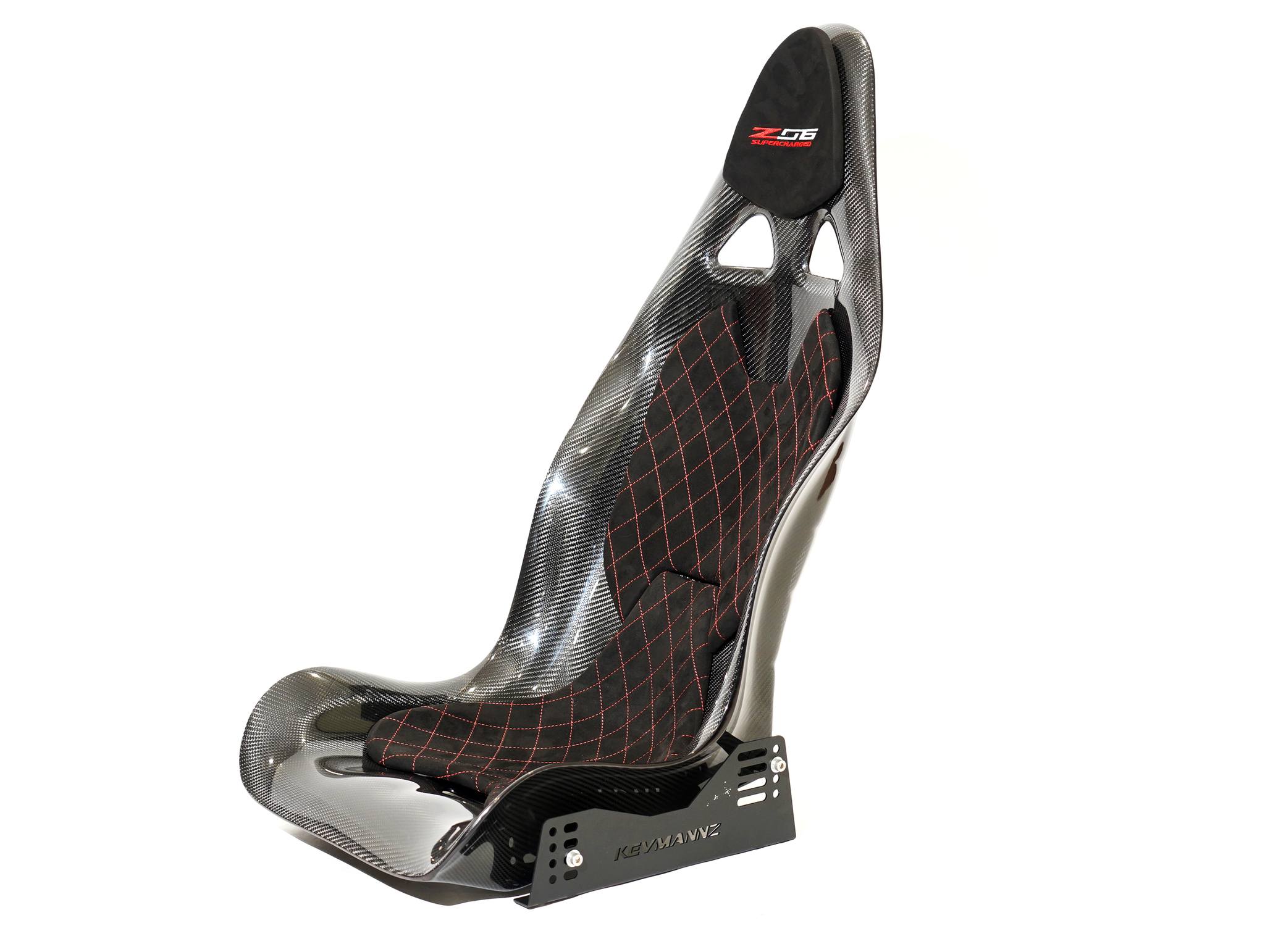 KevMannz full carbon fiber bucket seats V3, designed to fuel your passion and ignite your inner driving spirit. Featuring Corvette C7 (Z06) plug-and-play rails and slider kit, plus customized black Alcantara padding with a striking red diamond stitching pattern and Z06 logo on the headrest, these seats are the perfect catalyst for taking your driving to new heights.