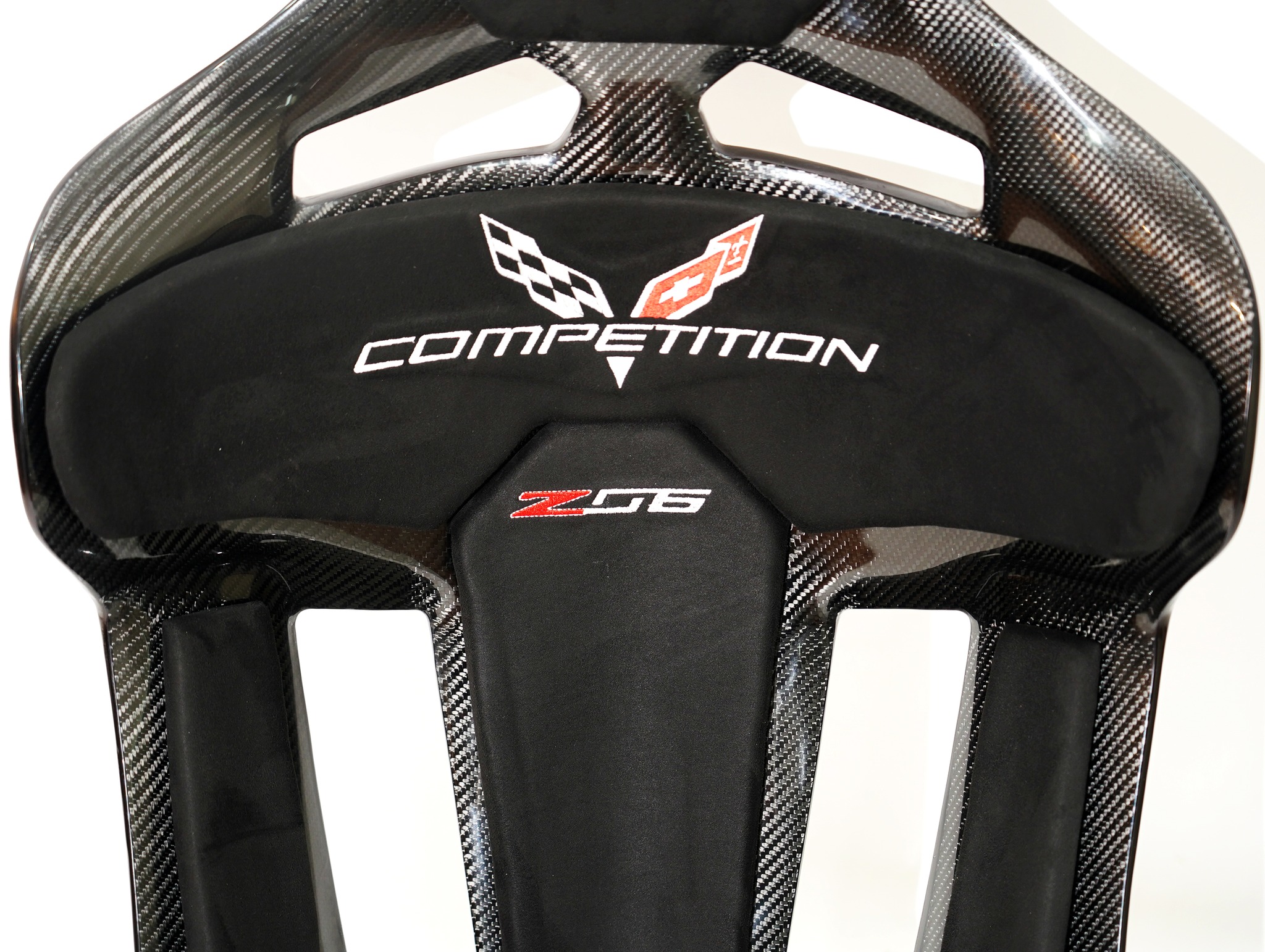 KevMannz full carbon fiber seats GT-Max including Corvette C7 (Z06) plug&play rails and slider kit, with black Alcantara padding and logo stitching.