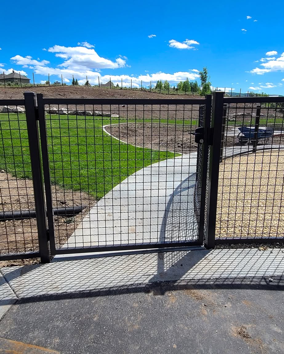 This custom gate adds a finished touch to the property while keeping the open views and natural surroundings as the main focus.