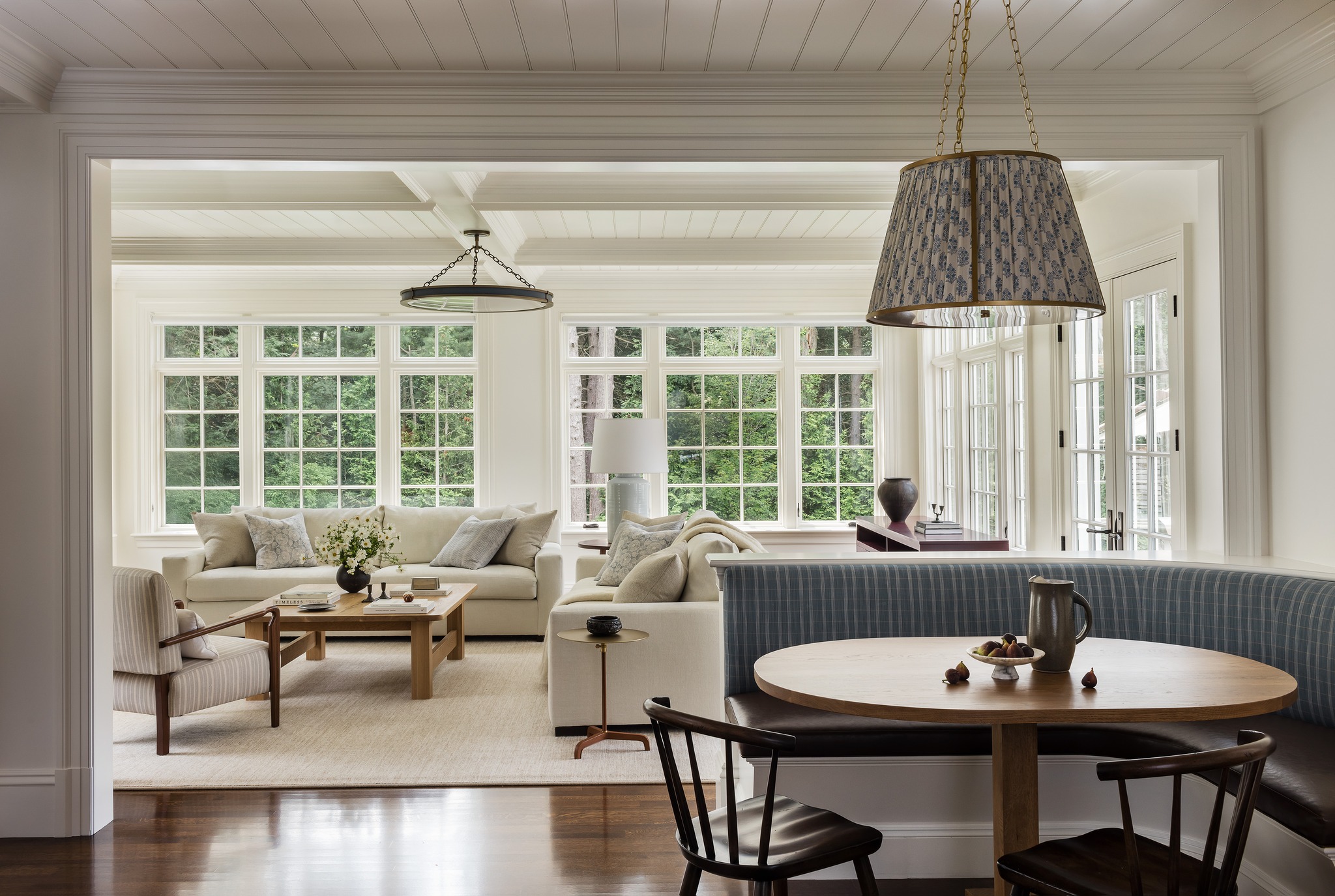 A sense of openness does not require sacrificing warmth or definition. Through considered sightlines, carefully scaled openings, and consistent craftsmanship, the living room and breakfast nook feel connected, comfortable, and naturally suited to daily life.
Photography: @joyellewest
Interior Design: @barkoffcoppola.interiors
Architect: @patrickahearnarchitect
#LivingRoomDesign #BreakfastNook #CustomHome #LuxuryLiving #OpenConcept #FineHomebuilding #ResidentialArchitecture #CustomBuilder #HomeDesign #Craftsmanship #NewEnglandArchitecture #MassachusettsBuilder #FallonCustomHomes