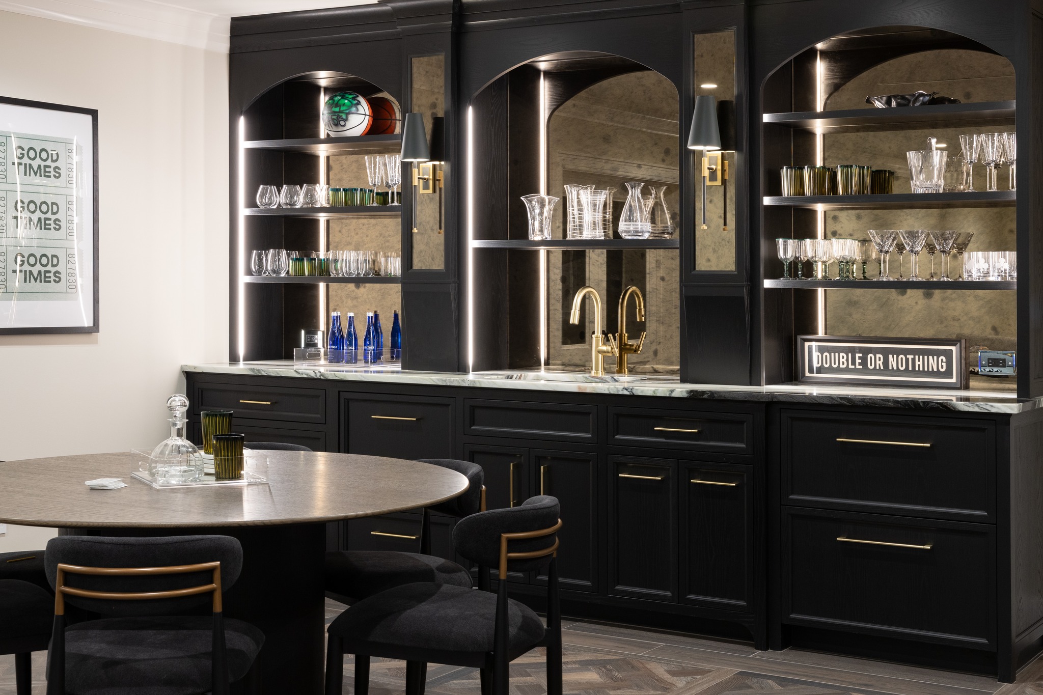 Dark, architectural, and rich in detail. The custom millwork in this entertaining space combines deep black cabinetry with illuminated arched shelving and antiqued mirror panels, creating a bar that feels equal parts classic and striking.
Cabinetry: Fallon Fine Cabinetry
Interior Designer: @tastedesigninc
Photographer: @emilyobrienphoto_design
Architect: @slocumhalldesign
#CustomBar #HomeBarDesign #CustomCabinetry #CustomMillwork #LuxuryMillwork #LuxuryInteriors #LuxuryHomes #EntertainingSpace #BarDesign #BuiltInBar #ArchitecturalMillwork #CabinetryDesign #InteriorDetails #BespokeInteriors #LuxuryHomeDesign #FineWoodworking #MoodyInteriors #CustomBuilder #MassachusettsBuilder #NewEnglandHomes