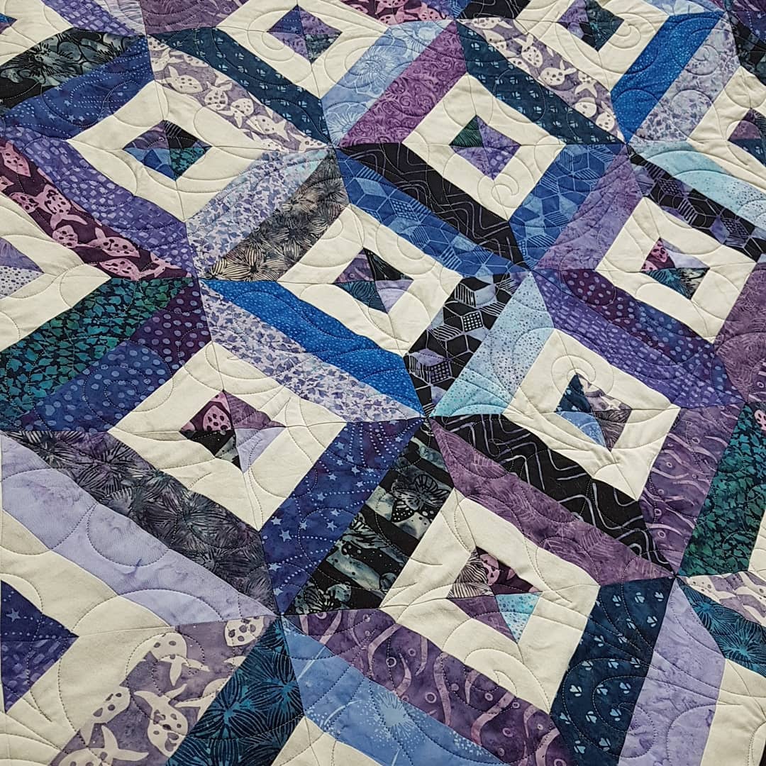 Yesterday was a double header! One quilt in the morning and another in the afternoon. Both of these batik quilts were made by Anna and are being gifted to some very special people in her life. I love how the colour pops against the black background on the second quilt. They are both quilted with edge to edge pantographs. Anna picked Deja Vu with gray thread for the light coloured quilt and Feather Flip with purple thread for the second one. Great choices Anna!
#quiltingismypassion #longarmquilter #quiltersinvictoriabc #canadianquilter #quiltersofinstagram #quiltersgottaquilt #quilting #apqsmillie30 #quiltpath #ilovebatiks #batikquilts #mistymountainstudio #thebatikplace #onlinefabricstore #mistymountainvictoriadotcom