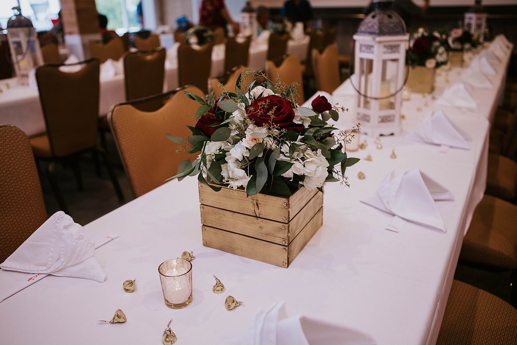Fresh flowers make a statement. @spinningwebflorist created beautiful burgundy, blush pink and white arrangements with a touch of gold.
We highly recommend having arrangements you can repurpose from the ceremony to the reception! Your florist or day of coordination team (us!) can help with the breakdown and setup.
Photo credit: @memorieswithjy