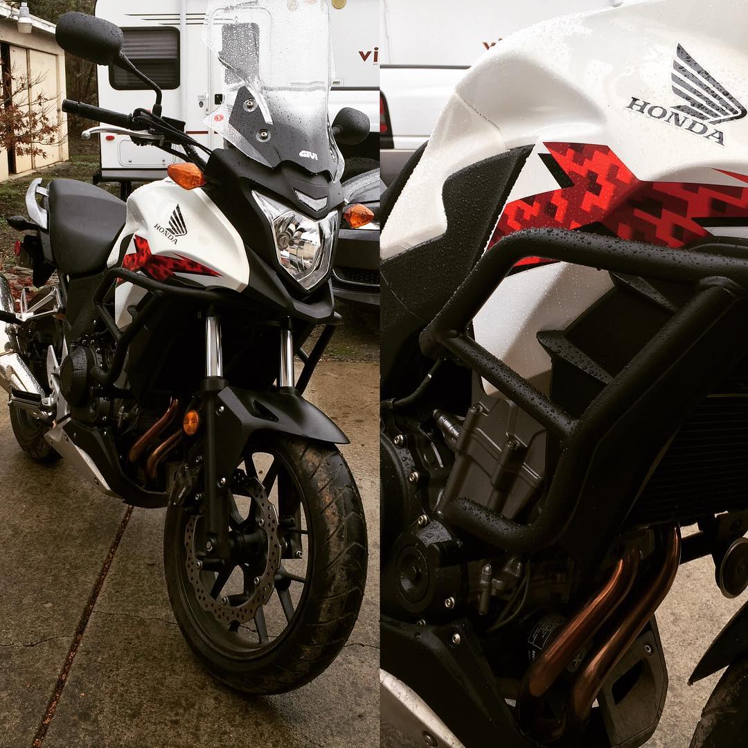 Installed Givi engine guards on Priscilla's motorcycle.