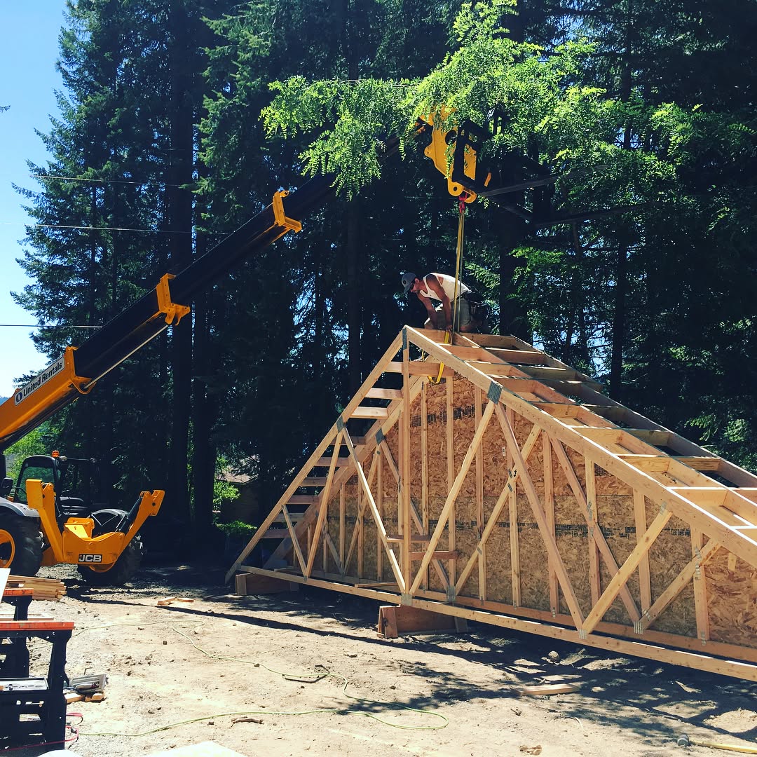 Another project, another day! Pretty neat photo of the process of building a section of roof for a shop and being lifted up into place. .
.
.
#kriscoconstruction 
#thisishowsitsdone #builders #shopproject #construction #kriscoconstruction #coeurdalene #contractors #shopbuilder #roofbuilding