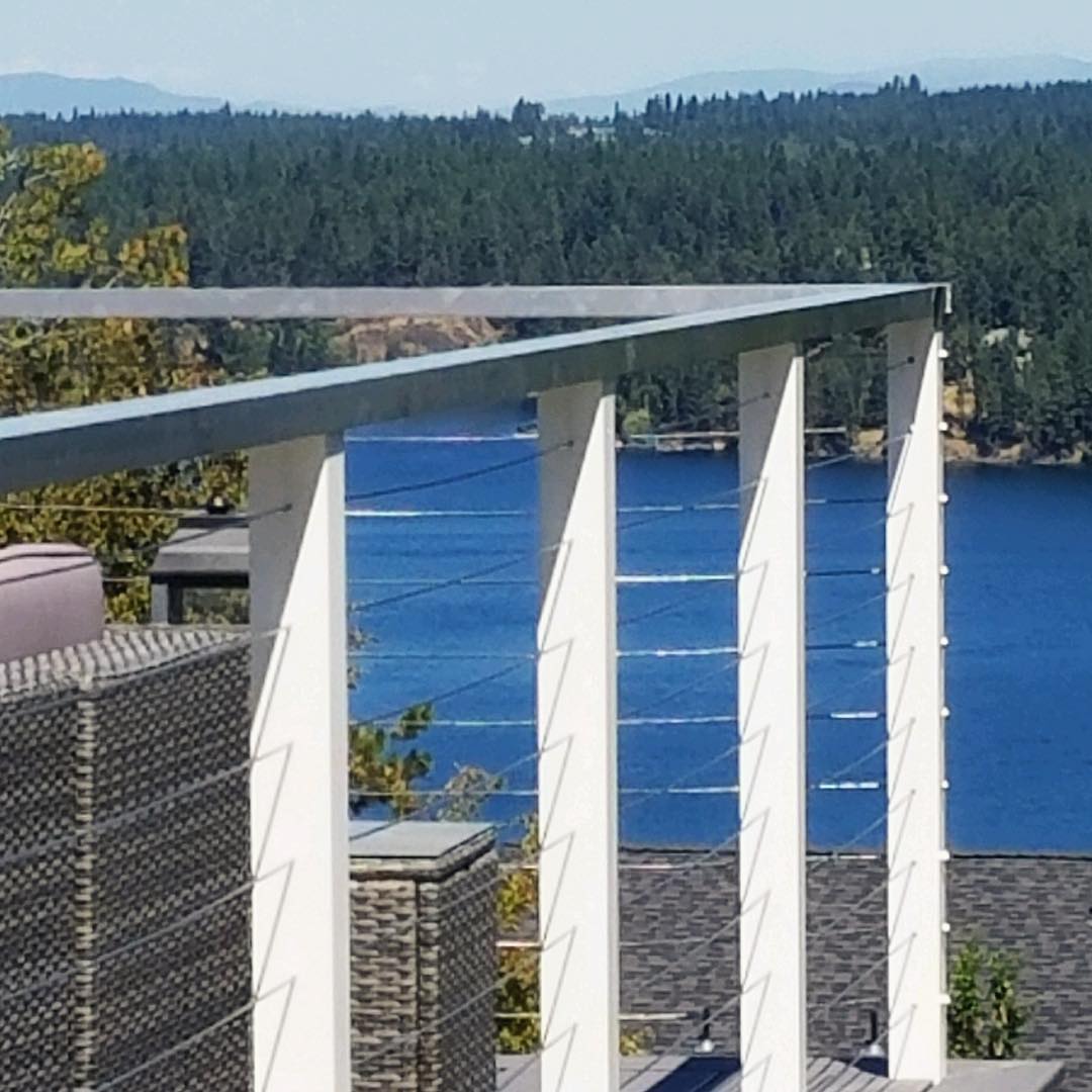 This Modern style aluminum handrail with stainless steel cable is finishing up nicely. Perfect timing for some summer nights overlooking the lake! .
.
.
#kriscoconstruction #construction #builders #haydenidaho #decks #modernbuild #summernightsonthedeck #completedprojects #contractors #custombuilt