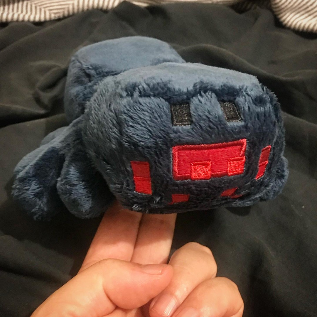 Recently purchased a few @minecraft plush teddies for my little man. He asked me which part was the Cave Spiders eyes and which part his fangs. My answer was โhis head has been sewed on upside downโ. See pic 2 for correct face.