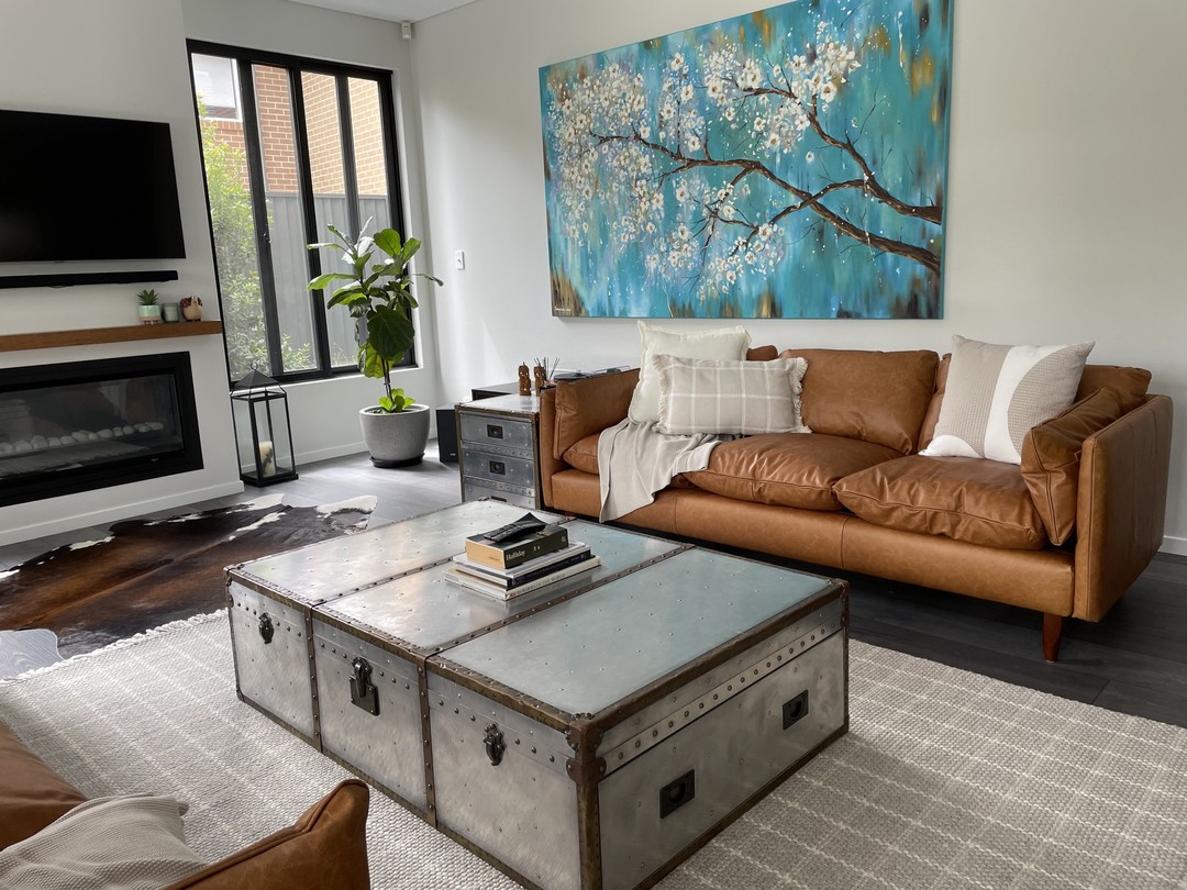 Our goal was to achieve a contemporary look with a relaxed industrial feel. Through the mix of textures and surfaces from shiny metal to rich vintage tan leather and a soft grey wool rug, a balanced space is created with earthy tones. Get in touch to discover how I can help you achieve your interior design goals. #ditaylorinteriors #interiordesign #homedecor #interiordesigner #decoration #interiorstyling #homesweethome #inspiration #interiordecorating #sydneyinteriordesigner