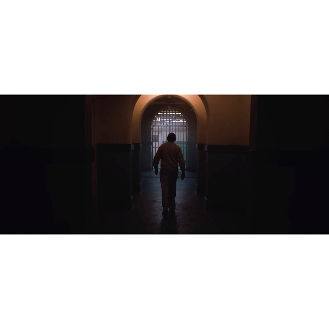 Another few shots from @absent_film 
This was the first scene we filmed, and was extremely challenging due to the immense time pressure and tight location space.
The biggest worry was keeping a consistency between the hallway and prison cell scene, which were originally completely different in look and style.
By gelling the lights in the cell to match the colours of the hallway, and using tungsten overhead fixtures in both settings, we were able to find a consistent look that matches what we were hoping for🎥