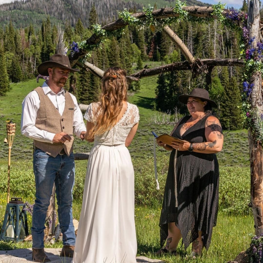 7.1.23
Chantae and Russ had a mountain wedding in the most beautiful location. Everything about their day was intentionally chill, and completely true to them as a couple!
Russ made the arch from wood gathered in the area, their favorite people were there to cheer them on, and of course, their dogs (and cat!) were there as well, they rode dirt bikes and drank beer and celebrated life and love!
Congratulations!