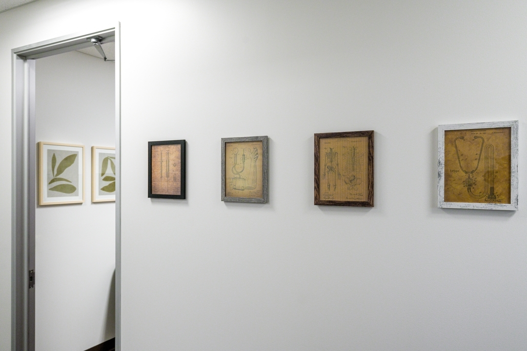 Curating a space of memories in every design – blending your personal art with our aesthetic touch.
Loved adding our clients artwork of vintage medical images to tie the space together.