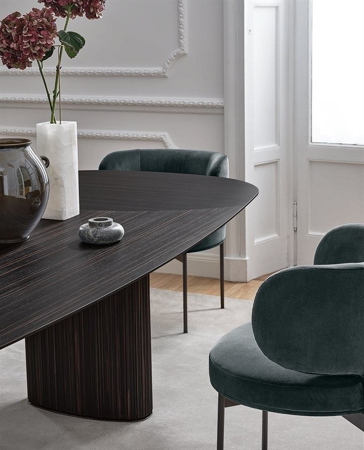 Elevate your dining experience with the timeless elegance of this wooden dining table, perfectly paired with the sleek and sophisticated dining chairs, here illustrated with a soft velvet fabric. This beautiful duo depicts Italian craftsmanship at its finest, creating a dining space that blends style and comfort.
#chic
#timelessinterior
#interior
#homedesign
#livingspace
#elegance
#inspiration
#furnituredesign
#italiancraftsmanship