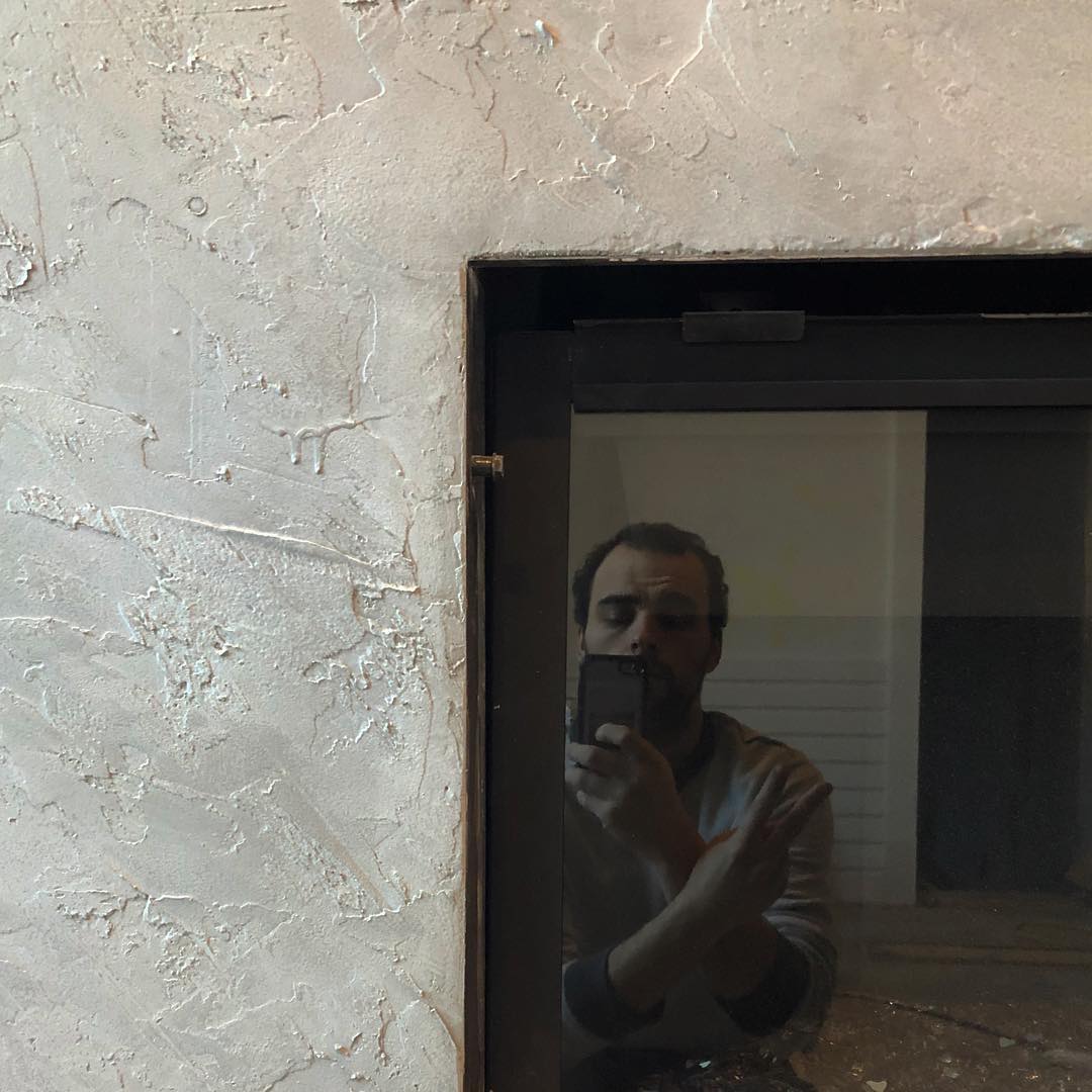 Textured a fireplace. This is also my first time giving the international sign of peace in a photograph. Felt right.