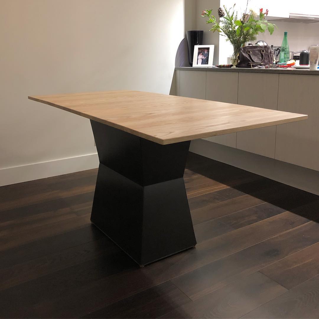 Love a good challenge. This bespoke piece in steel and white ash was very particular. It had to be wheelchair accessible and the tabletop collapsible so as to make the most of constraints of the space. By working closely with the clients, this piece truly earned the title of bespoke.