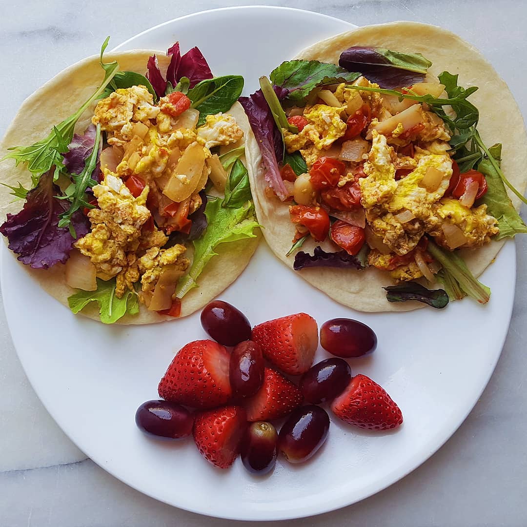 Who says you can't eat veggies for breakfast?? ๐๐
๐ฅ๐ฅ
.
.
One of my favorite ways to fit veggies in my breakfast is to saute peppers, onions and tomatoes together then scramble eggs into it. In this meal I even added some leafy greens by tossing a little spring mix in my breakfast burritos. Oh, and of course added some hot sauce for a kick! .
.
Plus, starting out my day with a full meal like this keeps me energized and full till lunchtime.
.
.
What are some ways you incorporate veggies at breakfast??
.
.
.
#tasteandsee #breakfast #morningfuel