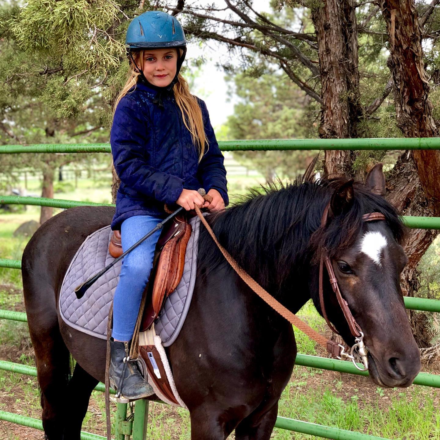 7-year-old Quinlyn riding 3-year-old Welsh, Indy. Swipe to see video! Indy is a testament to phenomenal breeding and to our colt starting program. Indy was started under saddle in November and ridden lightly over the winter. He’s brand new to riding in the full arena with a kiddo. Quinlyn has primarily been riding a 24-year-old Welsh/Shetland. It was a big step for her to hop on a green pony and go with his free-flowing trot. She did a great job using her core to stay balanced when Indy would momentarily hesitate at a set of poles but ultimately go through. It’s hard to remember what that felt like because as an adult that is a lot of years ago! I was proud of her for being able to resist getting off balance and instead be strong one minute to keep Indy going then soft next to allow Indy to continue on. Riding is so much about being punctual- it’s a lot of focus and self-control for a 7-year-old! Really, it is a lot of focus for anyone in this day and age where we are used to the rhythm of tv and movies where 3 seconds is considered a long camera shot. With riding you have to be present every step of the way, but so softly present and not micromanaging. It’s a great thing for a kid to learn and really has a lot of parallels to parenting. 💫 Follow to see more videos of Indy’s progress! Be sure to check out his earlier colt starting videos by going to our profile!
lessons, colt starting, and trick training ✍🏻 Comment if you think these two littles did a stellar job
💌 Message if you have questions about anything horse
🌈 Share if you’re excited to see ponies getting good starts so that more kids have access to gentle ponies!
#ponylove #instapony #ponyhunter #hunterpony #ponyforsale #welshpony #welshponies #welshponiesofinstagram #ponylove #ponyofinsta #ponyrider #ponygram #ponymom #naturalhorsemanship #equestrianblog #equestrianblogger #horsetraining #naturalhorsemanshiptraining #naturalhorsetraining #equineofinstagram
#pferdesport #horsebackride #coltstarting #smallpony