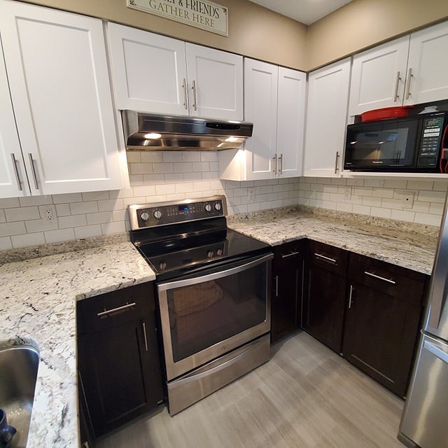 We also do tile work! Check out this kitchen backsplash we recently installed. The client picked a white tile to give the kitchen a fresh new look. Swipe right to see our process!