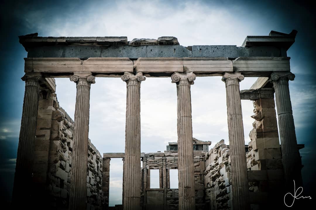 🏺🏛 ❗I present to you the Erechtheion a temple dedicate to the goddess of wisdom Athena and the god of the sea Poseidon and do not take this lightly! The two gods had competed ferociously for control of Athens with Poseidon who was rather egotistical and a sore loser throwing a tantrum in the form of a catastrophic flood upon Athens! The temple whose purpose was essentially to reconcile the two gods was constructed from 421-406 B.C and it is considered especially sacred perhaps the most sacred on the Acropolis as its location is the actual grounds of the competition of the two gods.
◾◾◾
Often I eavesdrop on the conversations of visitors at the Erechtheion (yes I know awful me) to hear that they are still talking about the Parthenon as if this sublime temple, by far my favorite on the Acropolis is a footnote totally overshadowed by the Parthenon! They witness the timeless beauty of the Caryatids that function as female architectural columns with resplendent sculptural detail especially in their hair on the south porch and to some extent overlook the east porch. However, I have always felt closer to the gods and Athena on the east porch which was dedicated to her with it’s six towering Ionic columns eternally standing guard! It is in this portion of the temple that the worshipers of Athena would perform sacrifices in her honor in the procession of the Panathenaic Festival and subsequently Panathenaic Games which were held every 4 years.
◾◾◾
The mathematical proportions in the architecture of the east porch commands the visitor’s respect you can feel even today how sacred this specific portion of the Erechtheion was. Whether you like it or not you are humbled in a subtle, nearly gentle manner that retains the classical Greek belief and expression in architecture that man is the measure creating a unique effect (at least to me!)
◾◾◾
✏️ What are your thoughts?
❗Date of Visit: Nov 19, 2019 – Weather Conditions: Cloudy
#greece #athens #travel #picoftheday #architecture #greektemples #greektemple #temple #travelblog