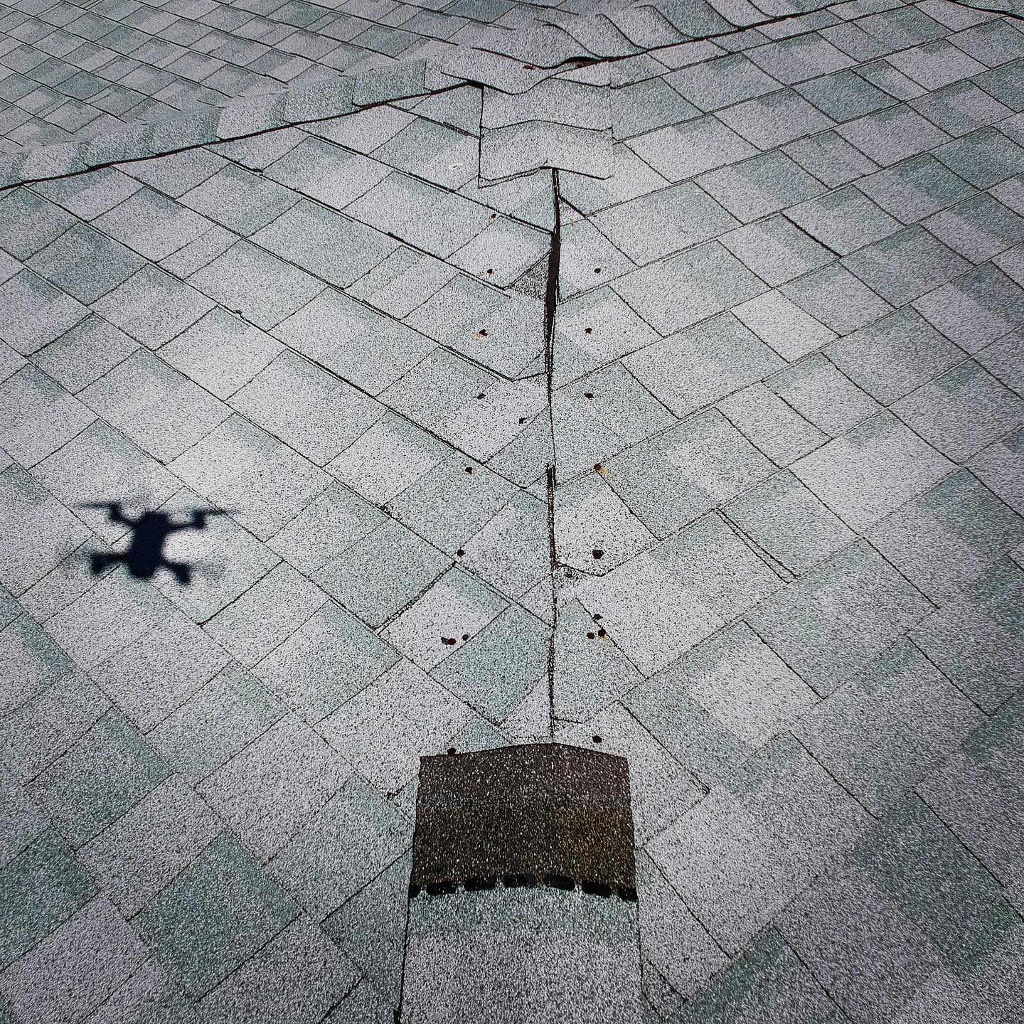 Drone inspection on a third story roof. Missing hip caps! We use all the tools to inspect from the roof top to the foundation.