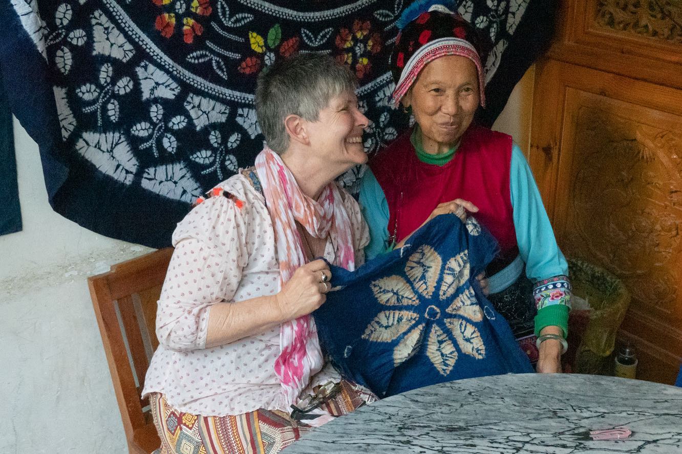 Indigo blue; cotton thread; sewing and laughter. In Dali in South-Western China I sewed, wrapped thread and dipped my cotton into liquid blue; under the instruction of the local Bai women in a small village on the outskirts of Dali; and together with Max and our Guides, had the best day.
This traditional practice of dyeing has survived for over a thousand years surviving the Cultural Revolution, when many other Dong traditions such as Shamanism, were stamped out by Communist ideology.
.
This process of botanical dyeing uses plants such as indigo, woad and mugwort which are native to the nearby mountains of Cangshan. These plants are not only used for dye, but for food, medicine and ornaments.
Historically in this region it is the men who harvest and prepare the dyes, whilst the women weave, prepare the cloth and do the stitching and washing of the dyed fabric.
A couple of dozen plants were used for dyeing. I learned that both acid and alkaline mordants were used to modify the colours.
I also learned of the sense of ritual involved in the dyeing process. Dyeing within the lives of the villagers was only performed on goat days in the lunar calendar from June to October.
Through our interpreter the ladies shared that they were trying to hold on to their tradition, but were fearful that their traditions were being lost as the young people moved away to the cities and their culture was being wiped out.
I’m so grateful to have learned this unique and special technique from these fabulous ladies. I had the best day. Swipe for pics and more on my website - link in profile.
. . #liveboldly#traveller #roadtrip #momentsofmine #dali #adventurer #journeywoman #indigo #travelmore #instatravelling #travelgram #explore #explorer #traveldiaries #livingthedream #travelawesome #traveldeeper #livefully #livecreatively #inspired #travelmore #wonderfulplaces #openmyworld #lovetotravel #seekmoments #botanicaldyeing #bai #handcrafts