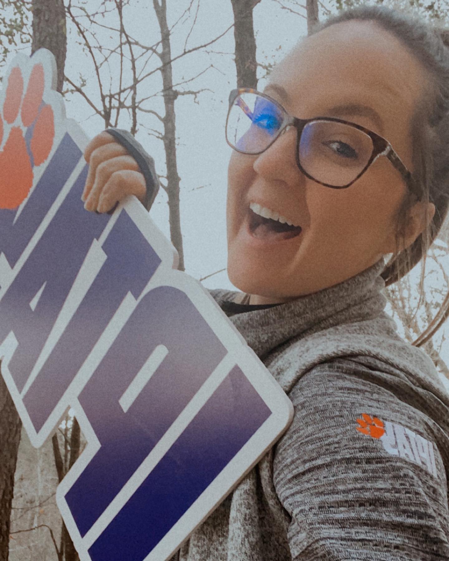 happy three year anniversary to myself & @iptay 🐯🧡 only fitting to share a photo of myself and the IPTAY sign since I ask all the student-athletes to do the same and be “super smiley”
