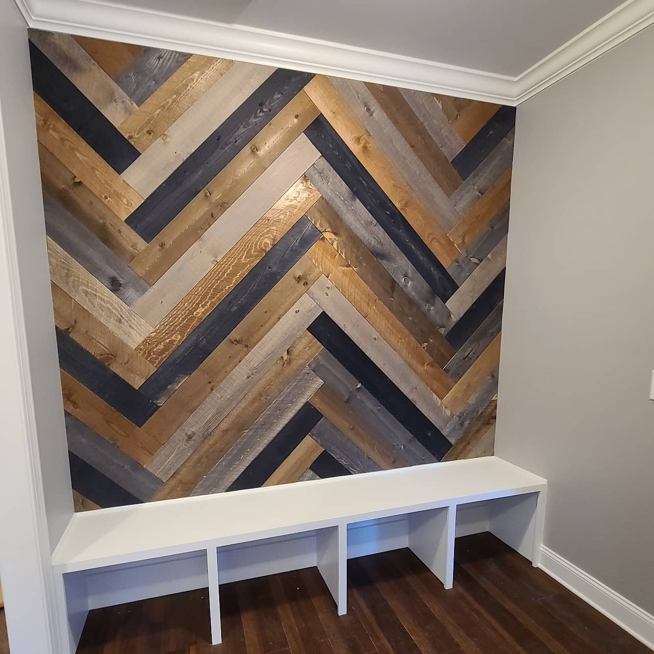 This #mudroom is taking shape with a custom touch of herringbone patterned barn wood.
#customhome
#customehomebuilder
#jontotherowconstruction
#mudroom
#dropzone
#barnwood
#mudbench