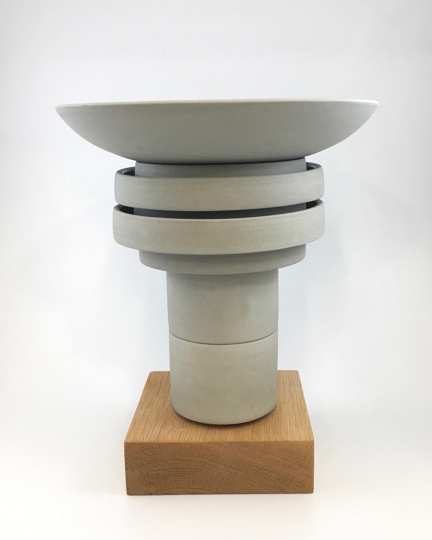 Inspired by concrete water towers, This 25 cm ht Tapas Tower is a fabulous fit for your kitchen counter, dining room table or sideboard. This tower incorporates 8 individual pieces and when deconstructed, the individual forms become pottery to use, the colours complimenting the dishes you create. This tower includes a 25cm diam bowl, brilliant for sharing a summer salad, a winter pasta dish, or a bowl of triple fried chips, Two Tapas plates as well as three smaller ones for those indiividual sharing bites are included as well as two Maggie Tumblers which are great for drinks, soups, sauces and dips, or those homemade breadsticks you've been meaning to share. Swipe to see this tower deconstructed.
For more info on this piece and others like it check out my #newonlineshop #wheelthrown #mugs #pottery #architecture #watertower #contemporaryceramics #modernism #brutalistarchitecture #towers #foodie #foodstyling #tableware #share #contemporaryart #designermakeruk #functionalsculpture
#handmade #kitchenstyling #brutalceramics #handmadeinwales