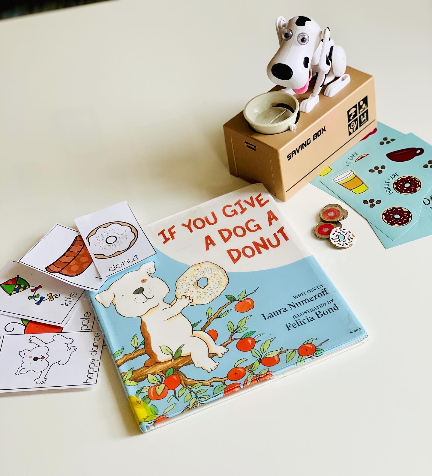If you give a dog a donut, your kiddos will giggle and ask for more! I like all the “If You Give...” books to target vocabulary, expressive language and articulation. Here I used a fun doggy bank and put donut stickers on the coins for extra fun 🍩 Bonus: The bank makes it easy to elicit several repetitions of target words!