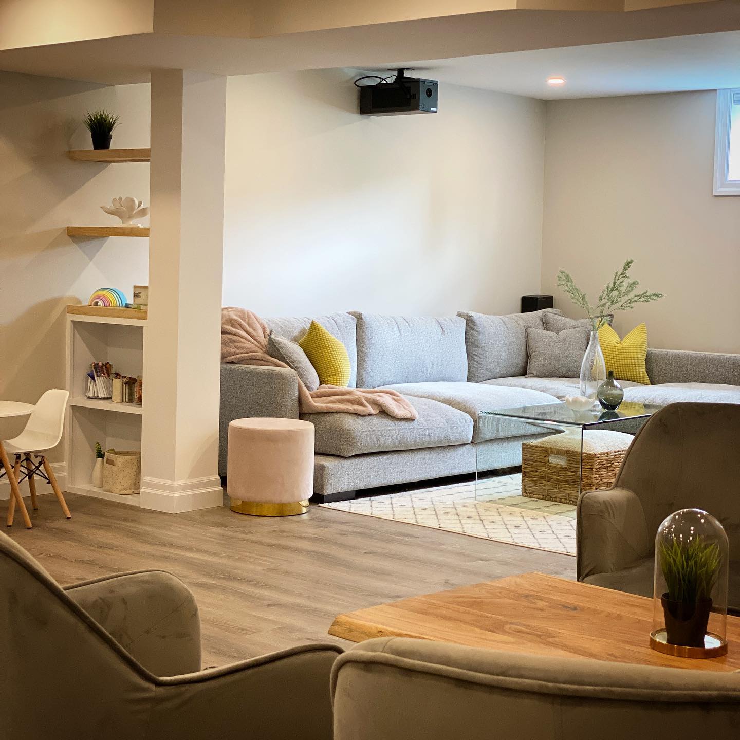 This is such a amazing space to cozy up with the family and enjoy a great movie #recroom #livingspace #livingroom #projector #familytime #moviesandpopcorn #cozy #furniture #bright #entertain #design #interiordesign #house #home #evolveinteriordesign Design by @evolve.interiordesign , Construction by @watersedgecontracting