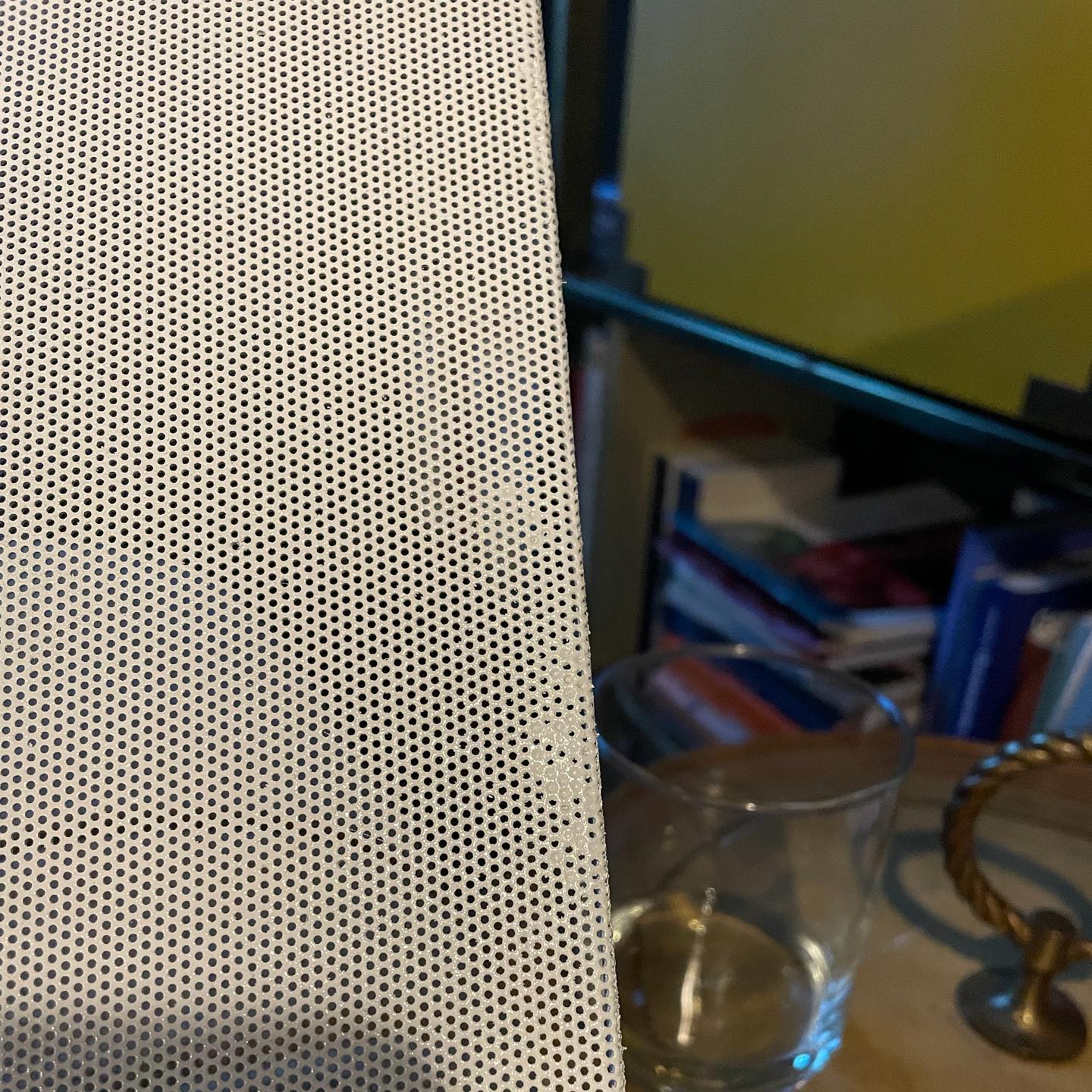 In my personal life I deliberately rage against #perfectionism (I believe it’s a toxic and impossible ideal.)
I also try to carry this mindset into my work. Which helps with sanity and perspective in an industry with SO many variables.
But, I also passionately believe in delivering a great product, and that details matter!
Which means, sometimes, you punch out the holes on your client’s painted speaker covers while sipping a glass of wine on the sofa.
#balanceinallthings #interiordesign