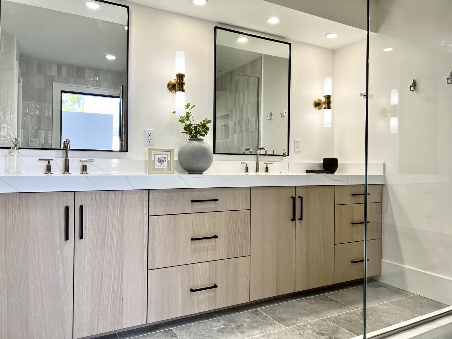 Rift white oak in its finest application! #whiteoak #riftwhiteoak #modernvanities #moderncabinetry #moderncabinets #modernbathrooms #beautifulvanities