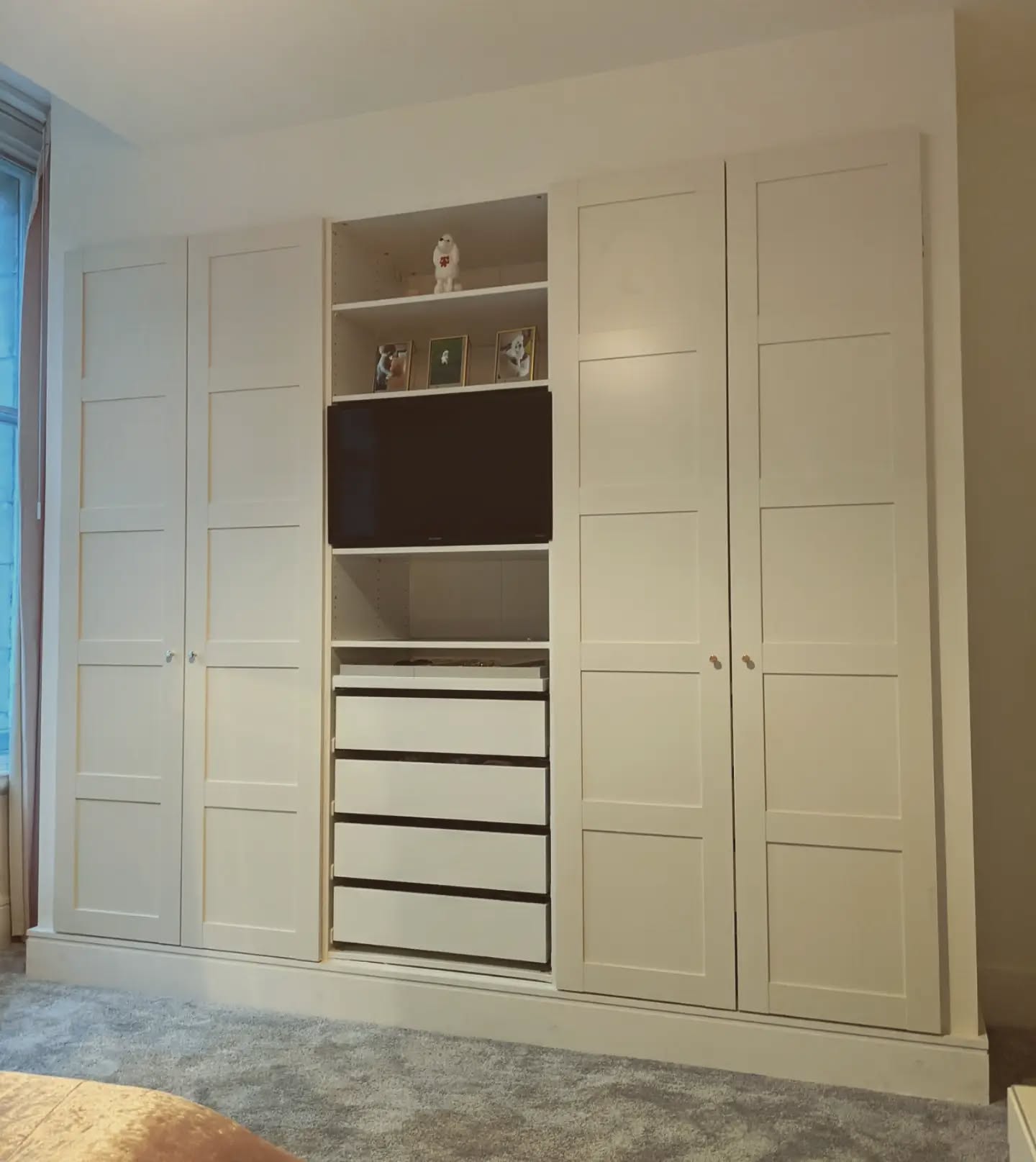 Another fitted wardrobe including TV mount. Framed out, plastered in and wrapped with skirting boards.
Contact us on our website if you're after something similar!
www.iamflatpackman.co.uk/enquiry