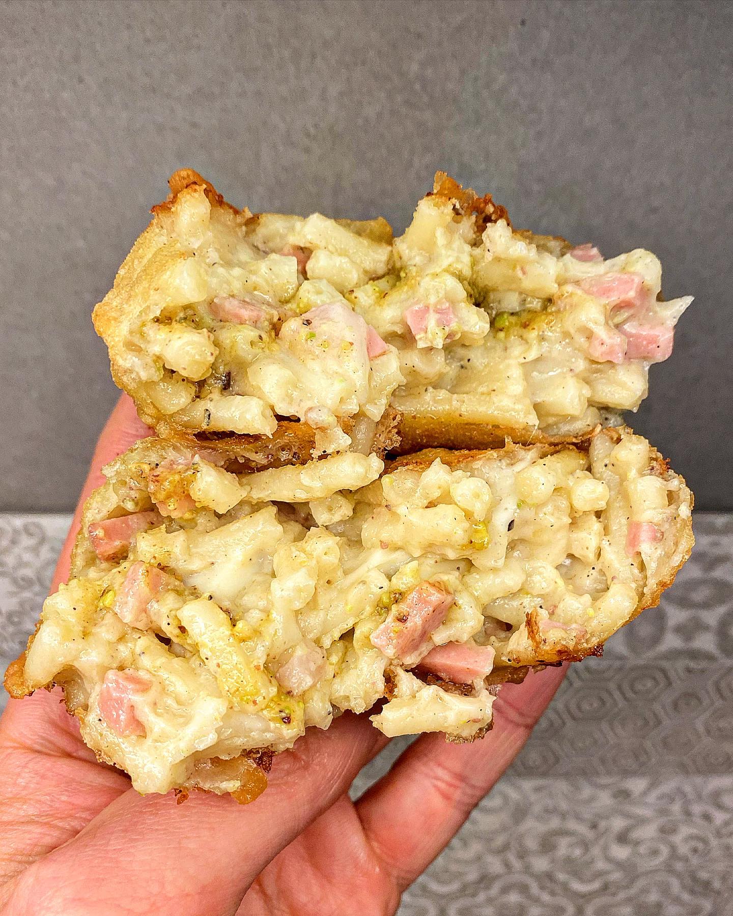 FRITTATINA by @golocious 🤤
If you’re in Naples, you could stop by the first pizzeria or deli you find to order one of the frittatine di pasta, or Neapolitan pasta fritters! Not familiar with them? Well, they’re not just little versions of a spaghetti frittata; rather, they’re fried medallions of pasta mixed with béchamel sauce and stuffed with a delicious ham and pea filling (in the pic a pistachio-mortadella version). You can chomp away on Neapolitan pasta fritters while exploring the alleys of Naples or waiting your turn outside of a pizzeria as an appetizer before tucking into a delicious pizza margherita! These fritters are a Neapolitan street food delicacy that’s truly hard to resist 😍
.
#foodporn #pistacchio #mortadella #streetfood #naples