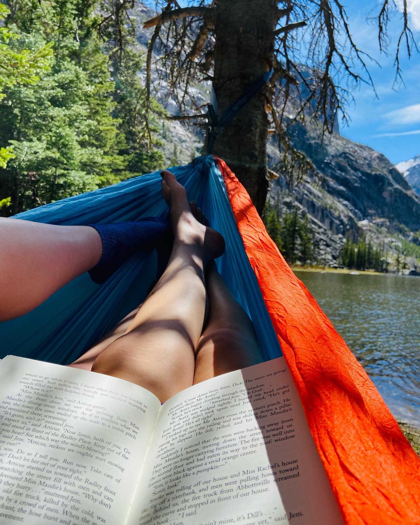 to kill a mockingbird in the mountains by a lake is my new love language <3 #lighting #photography #mountains #hiking #hammock #bookstagram #view