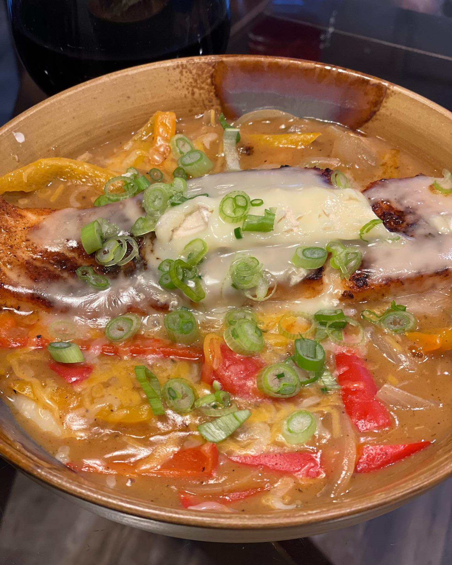 Finally got to make dinner this week. Blackened salmon topped with Brie over cheesy grits